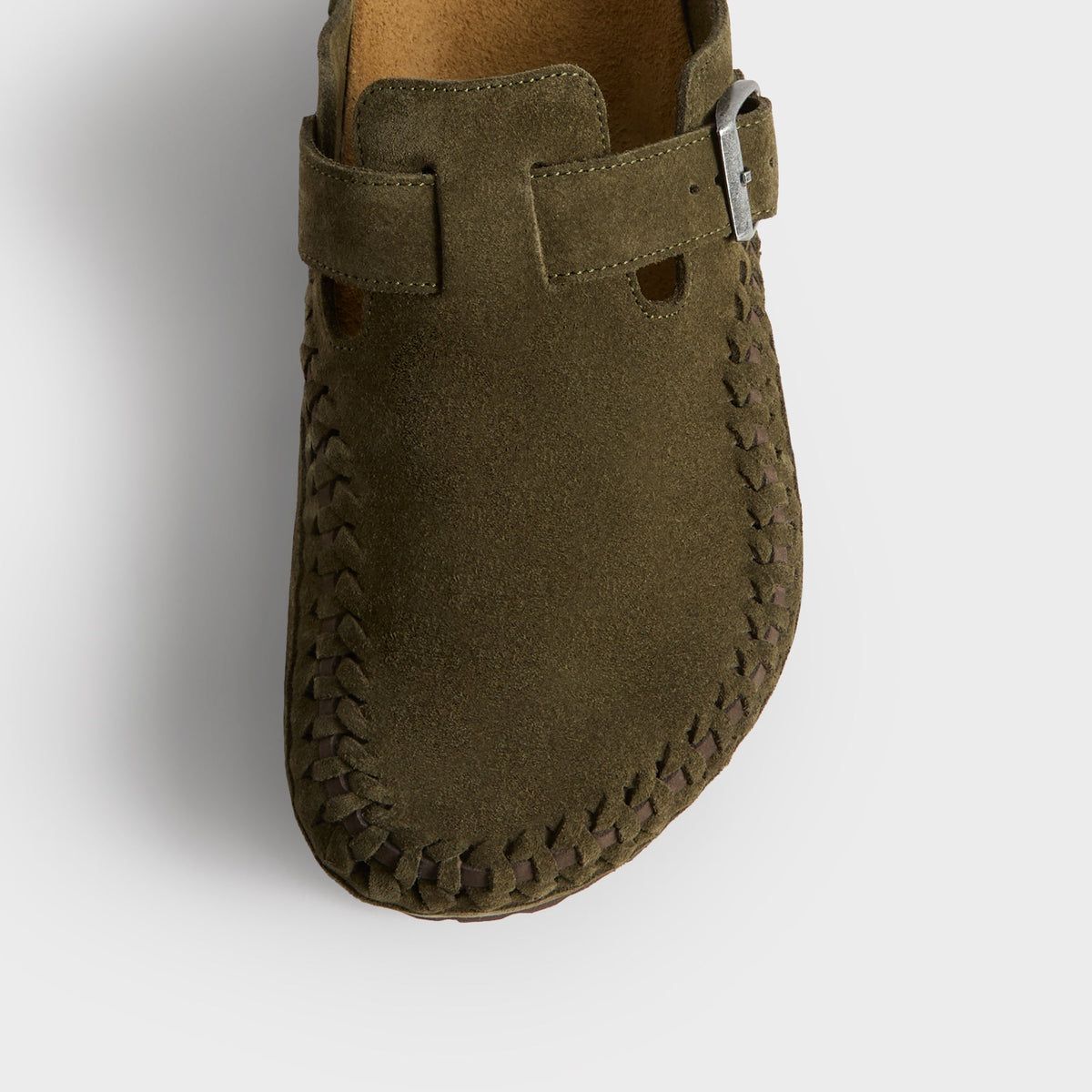 Kith for Birkenstock Boston Braided in Thyme, overhead close-up of the braided toe edge and olive suede strap