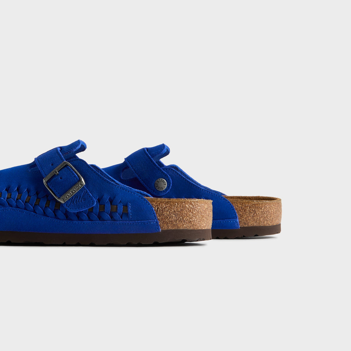 Kith for Birkenstock Women's Boston Braided in Ultra Blue, close-up of the pair's cork footbeds and heels with buckle straps