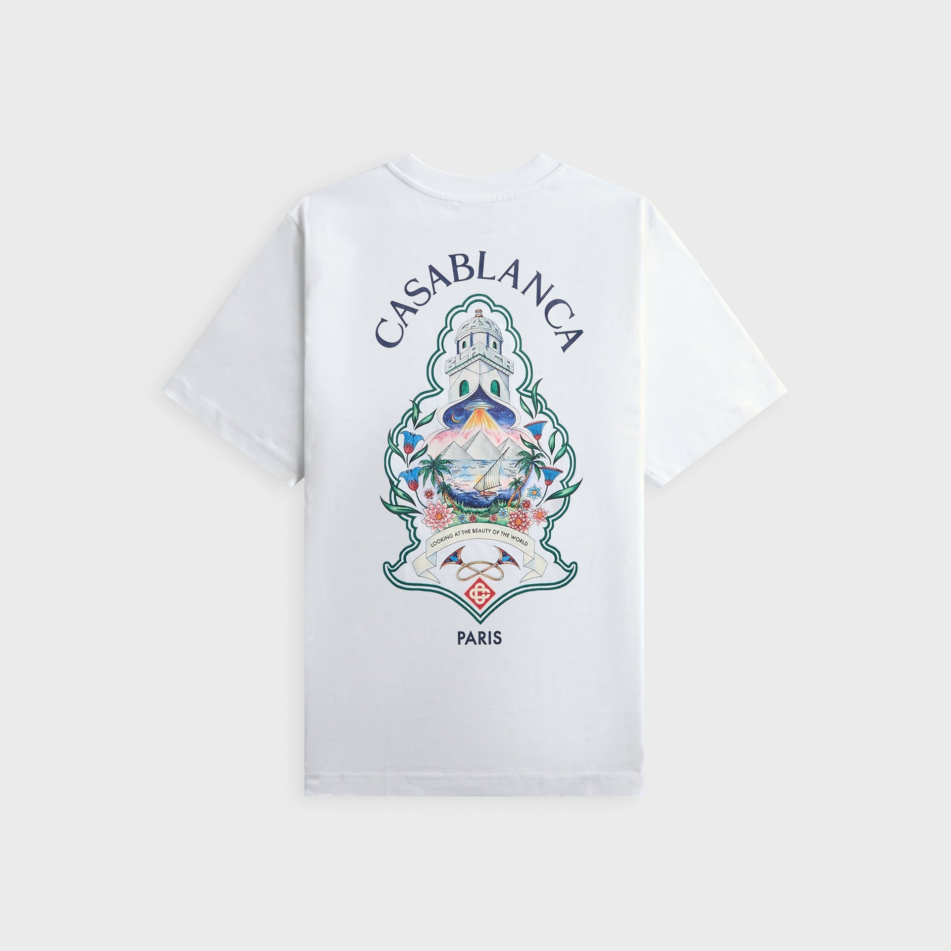 Casablanca Hotel Emblem white tee, back view with large lighthouse, island, sailboat and pyramids emblem and Casablanca Paris text