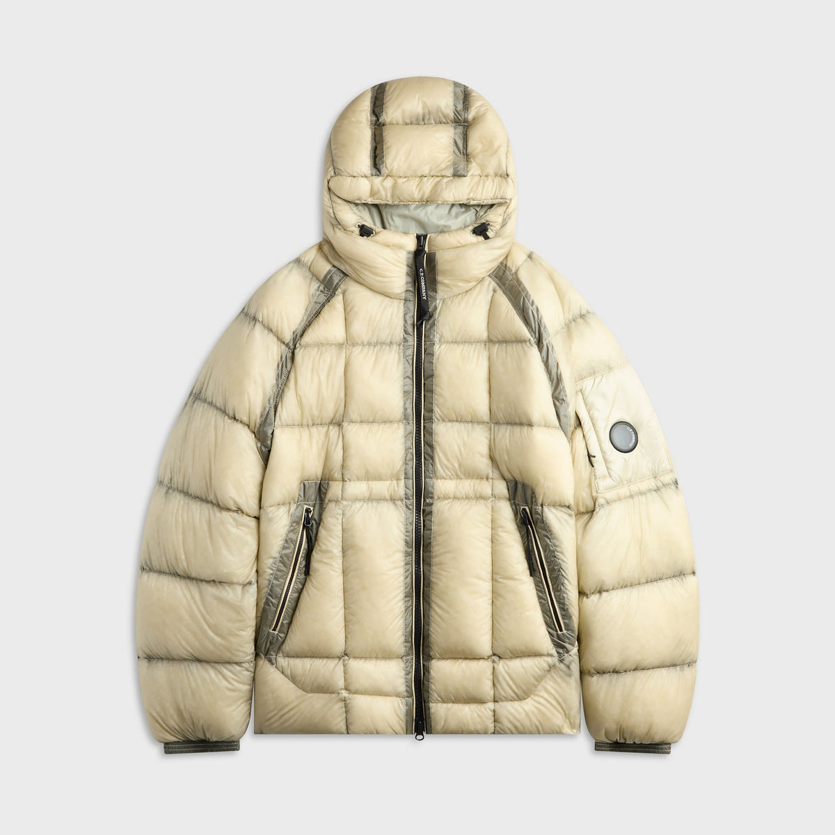C.P. Company D.D. Shell Hooded Puffer Jacket in Silver Birch, cream quilted puffer with lens detail on sleeve, front view