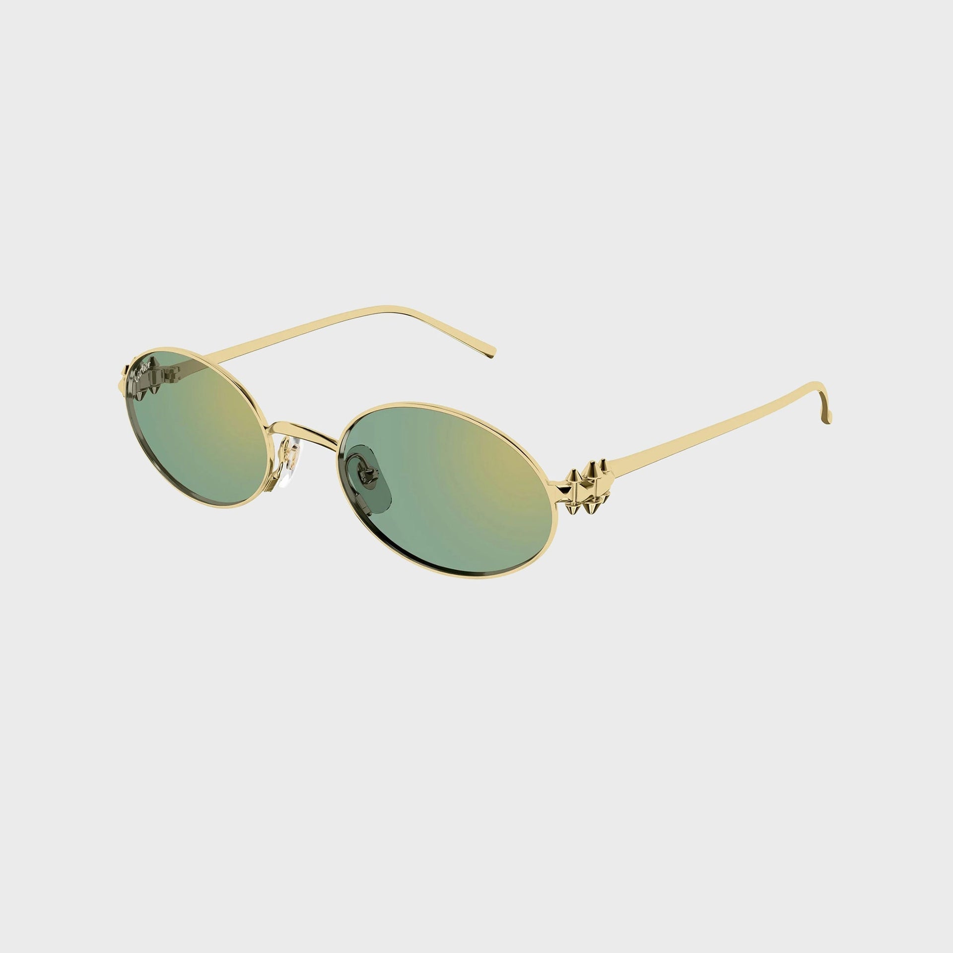 Cartier Clash CT0644S gold oval sunglasses with green gradient lenses, angled view showing the studded gold spike temples