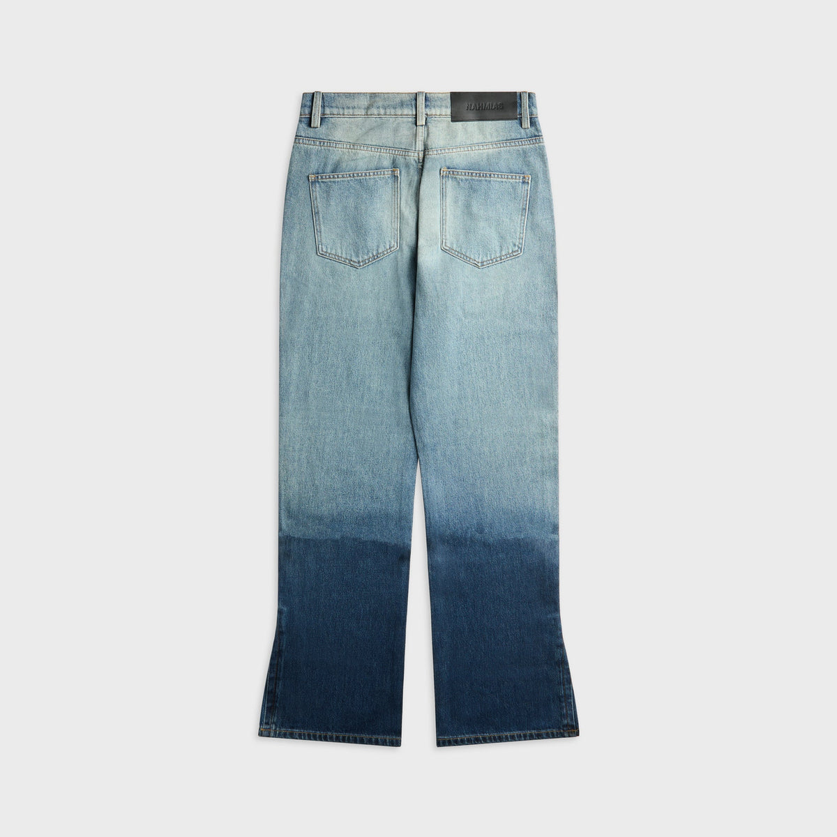 NAHMIAS High Tide Split Seam Straight Leg Jean in Medium Indigo Wash, denim with ombre indigo fade at the hem, back view