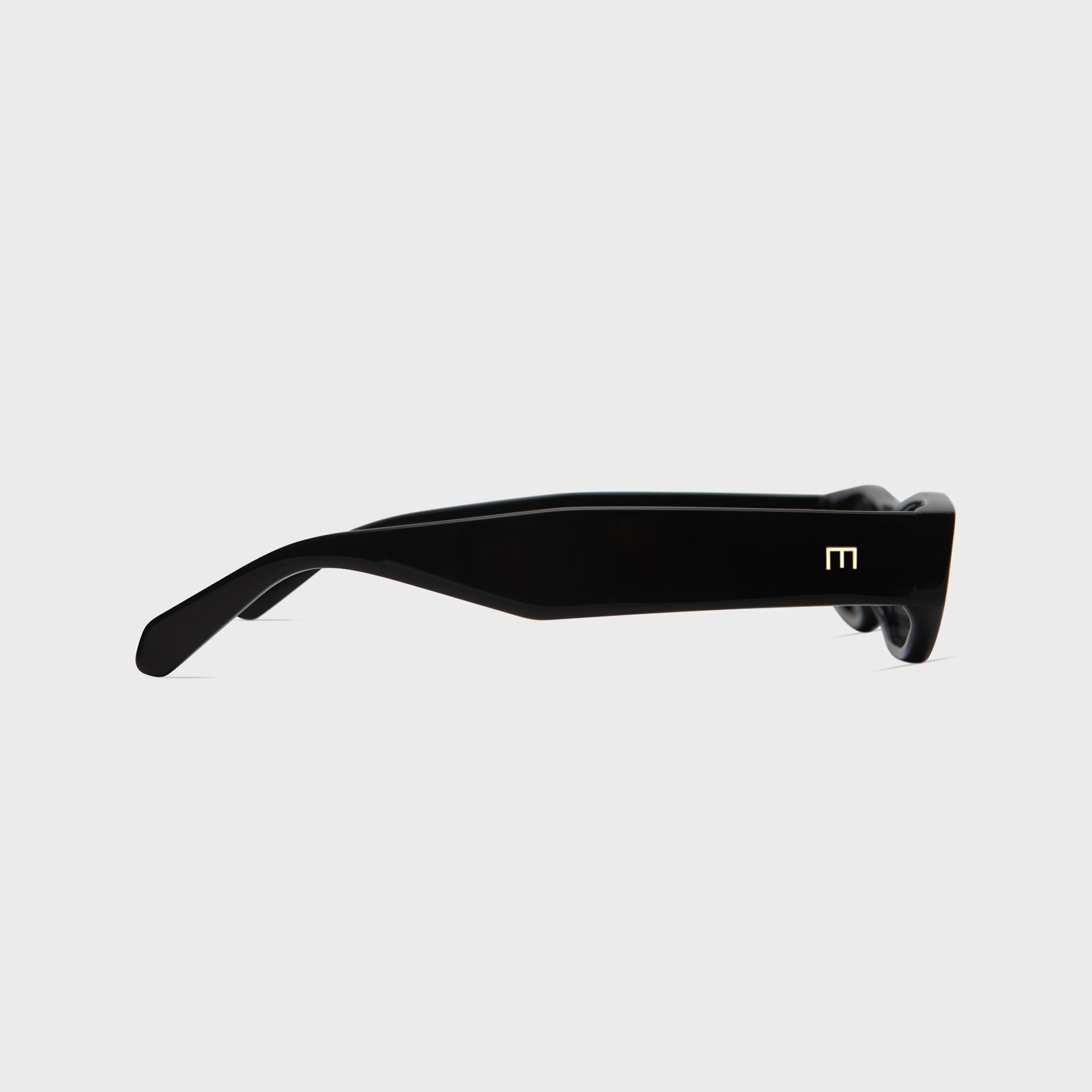 Elisa Johnson Yves gloss black oval sunglasses, side profile view