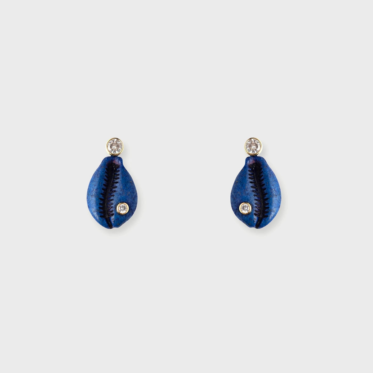 Eliou Coralina Earrings in Blue, pair of blue cowrie-shell shaped drop earrings with crystal studs