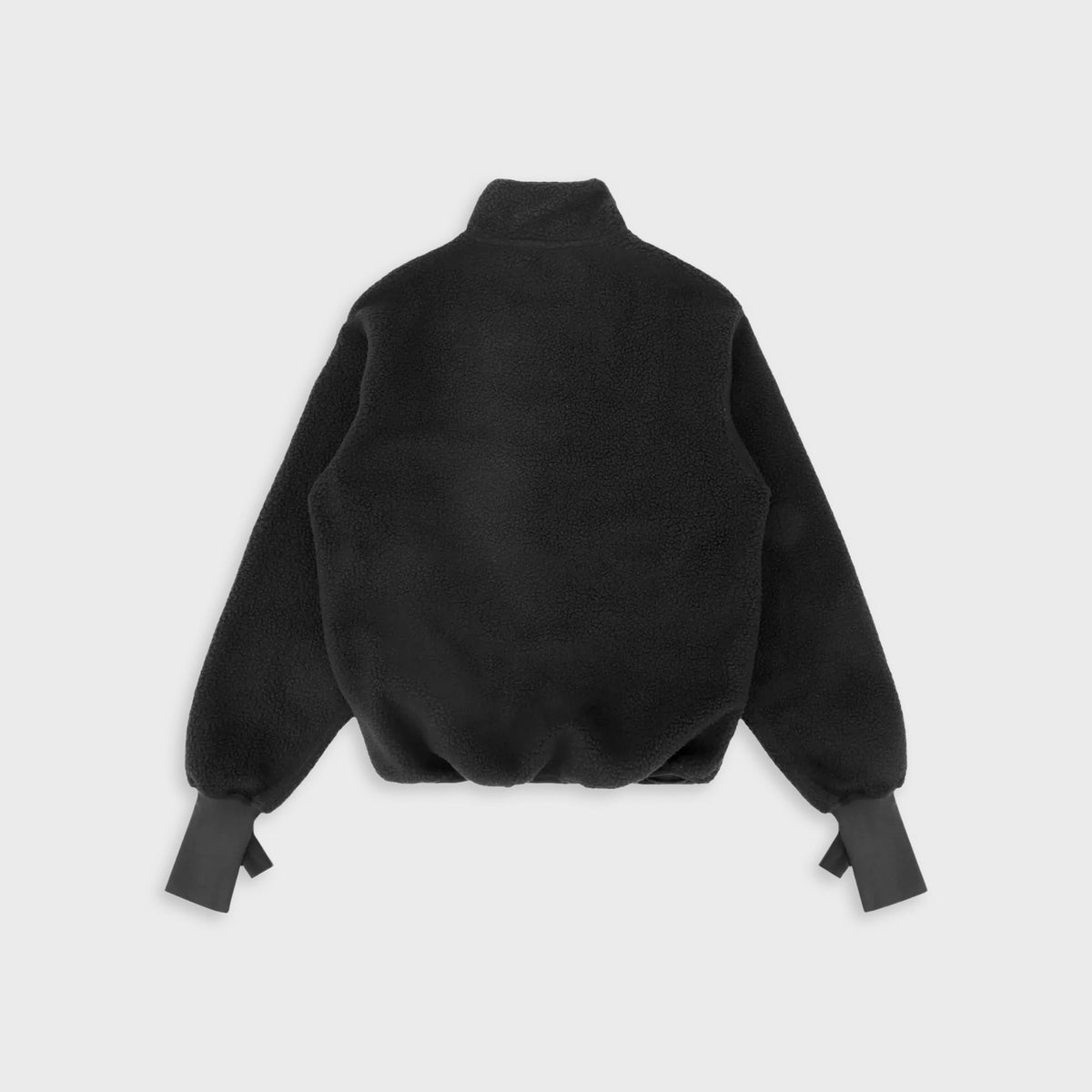 Entire Studios Shell Fleece in Black: back view of black sherpa fleece pullover with adjustable cuff tabs