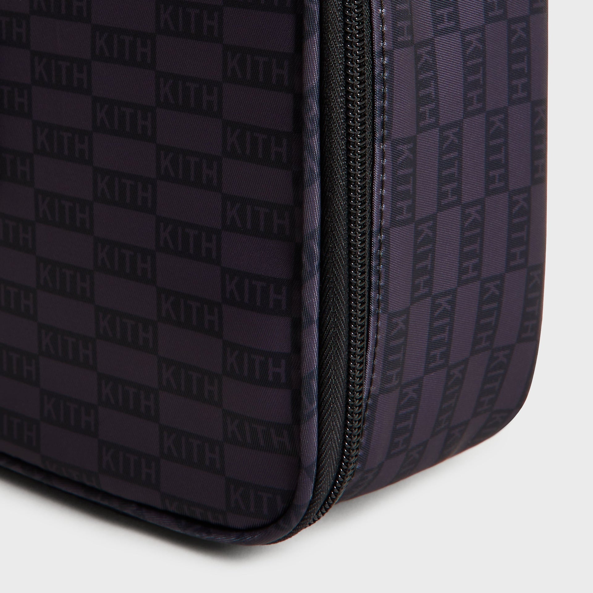 Kith Kids for STATE Rodgers Lunch Box side view close-up of black zipper and tonal Kith checkerboard fabric