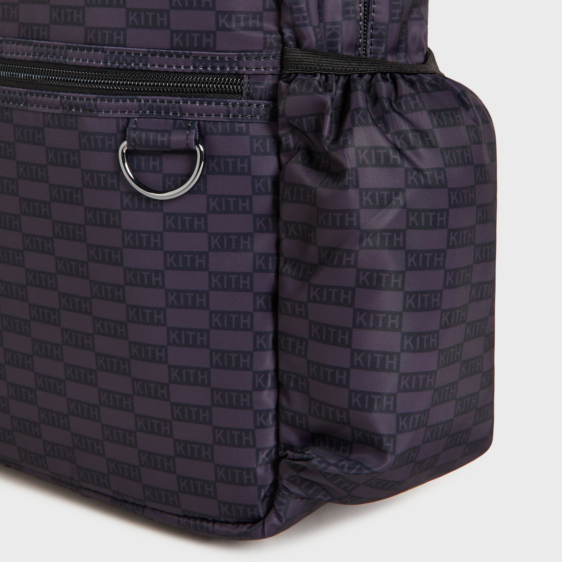 Kith Kids for STATE Kane Backpack, close-up of side pocket and silver D-ring detail