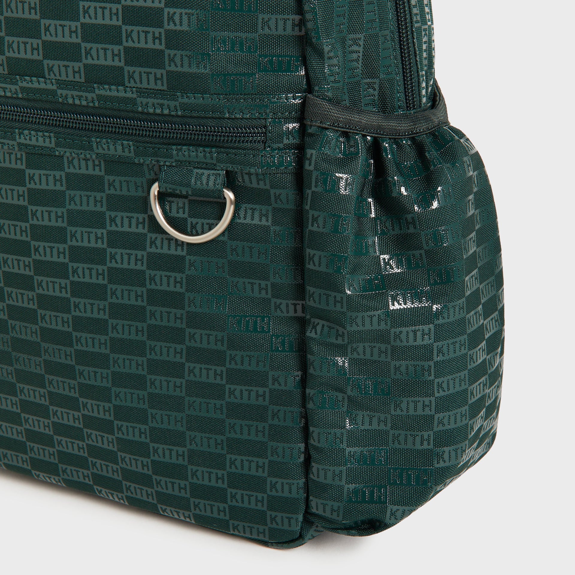 Kith Kids for STATE Kane Backpack in Stadium green, side detail with silver D-ring hardware and pocket