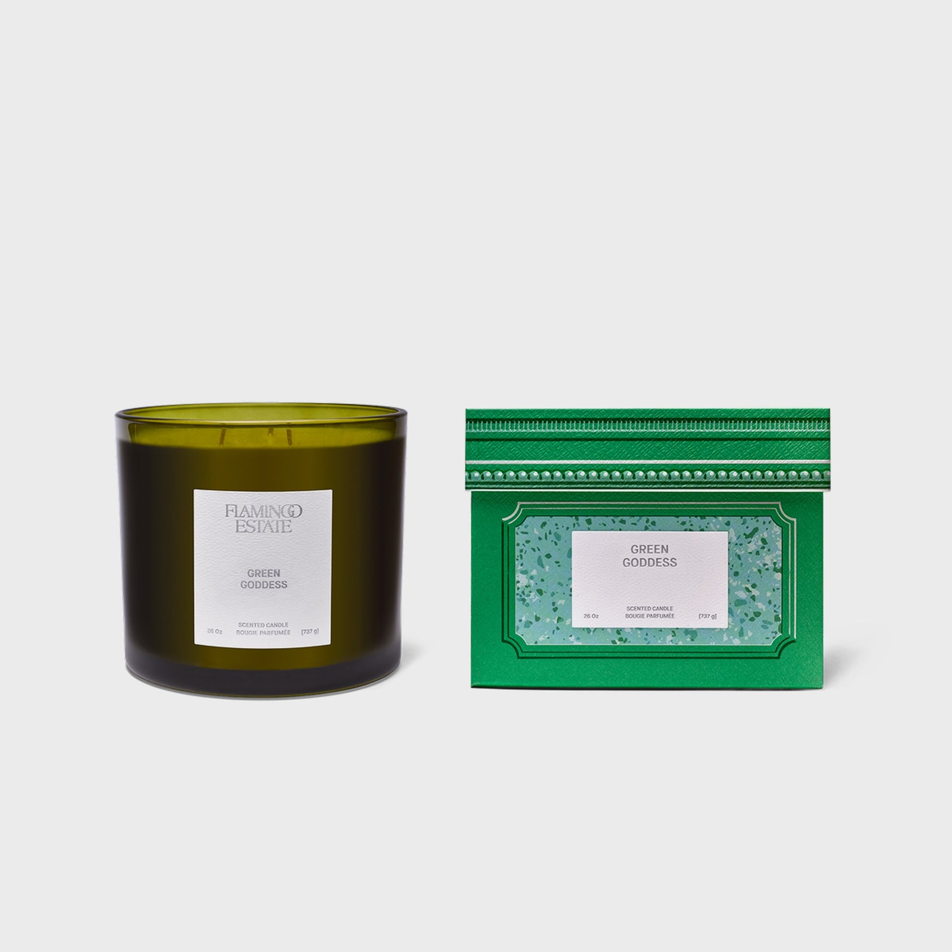 Flamingo Estate Green Goddess XL 737g candle, olive glass jar with double wick beside green gift box