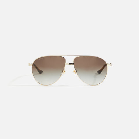 Gold Aviator metal sunglasses, Gucci