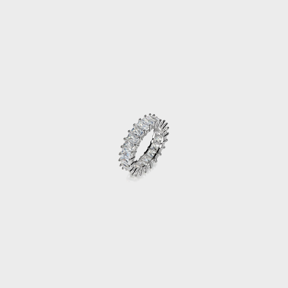 Hatton Labs Baguette Eternity Ring in white, angled three-quarter view showing prong-set baguette stones and band depth