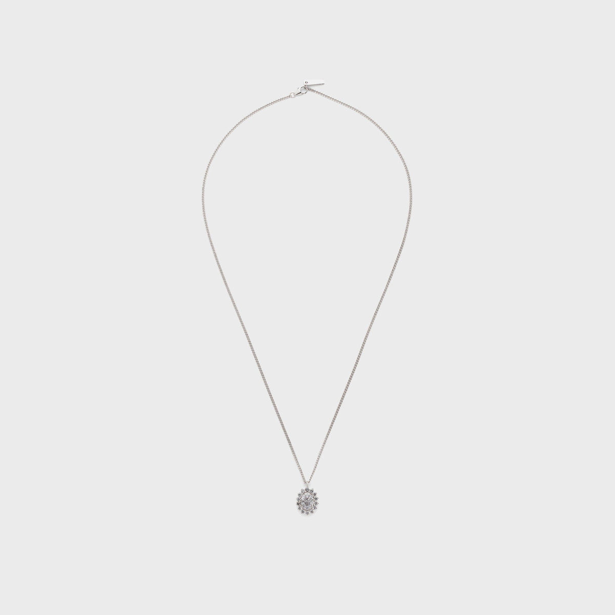 Hatton Labs Crown Stone Pendant Necklace in white, full-length view of silver curb chain with small oval halo pendant