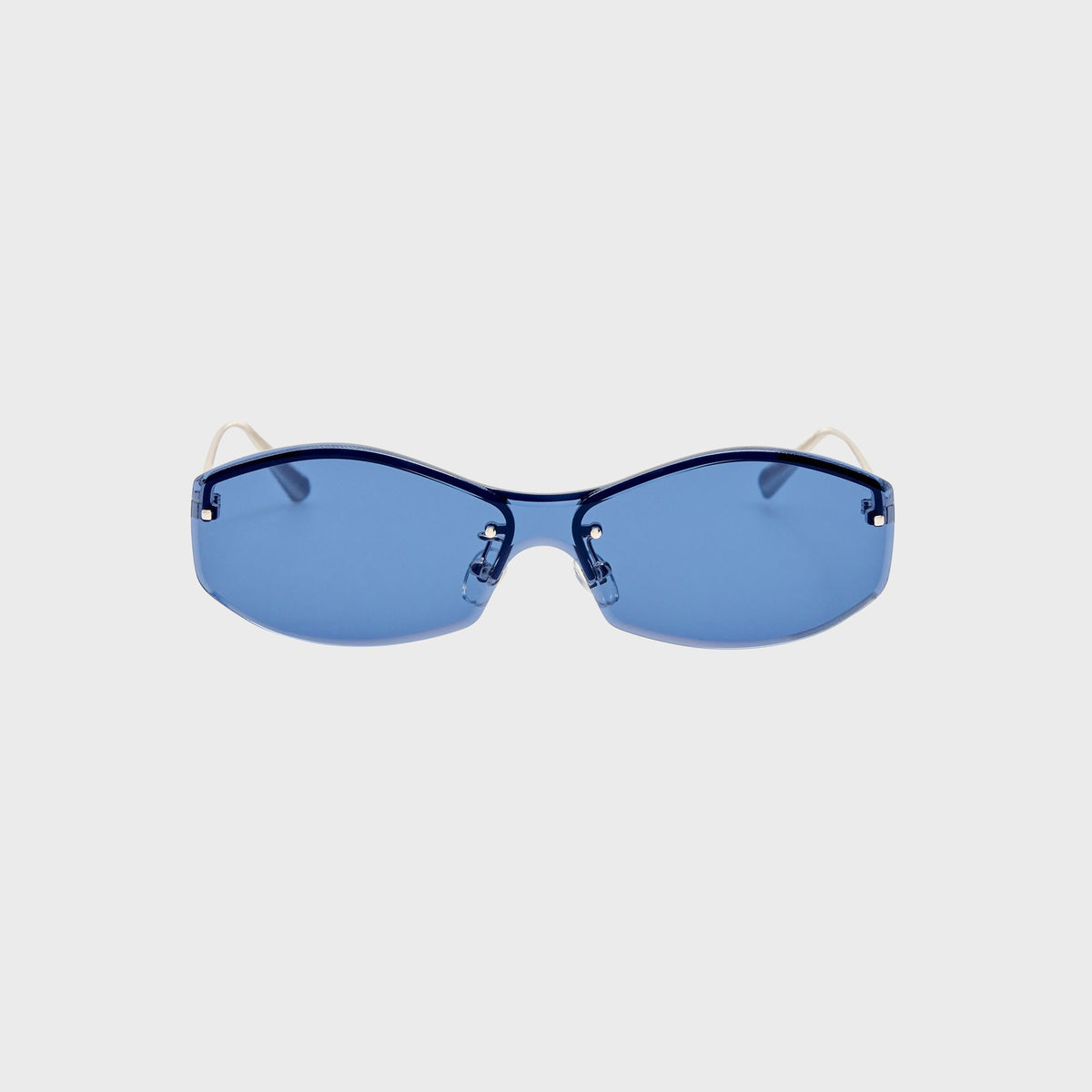 Jacquemus Jac 206 rimless sunglasses with blue lenses and silver metal temples, three-quarter front view