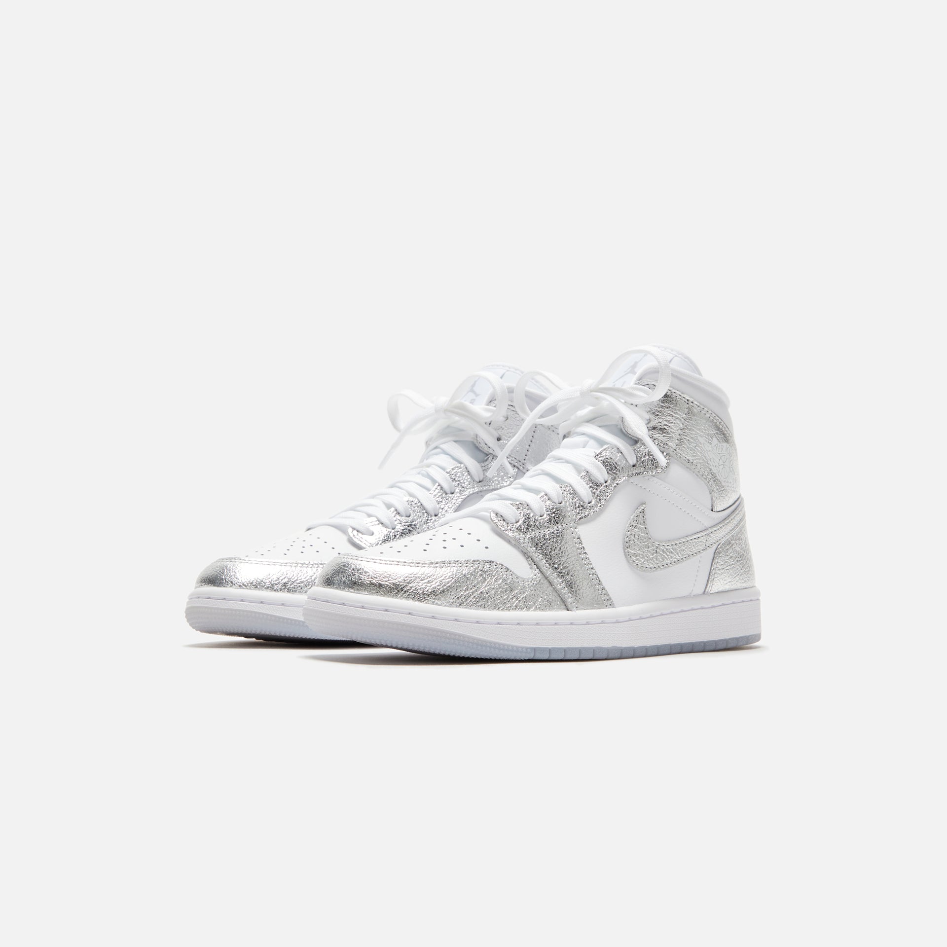 Jordan WMNS Air Jordan 1 Mid SE - White / Metallic Silver