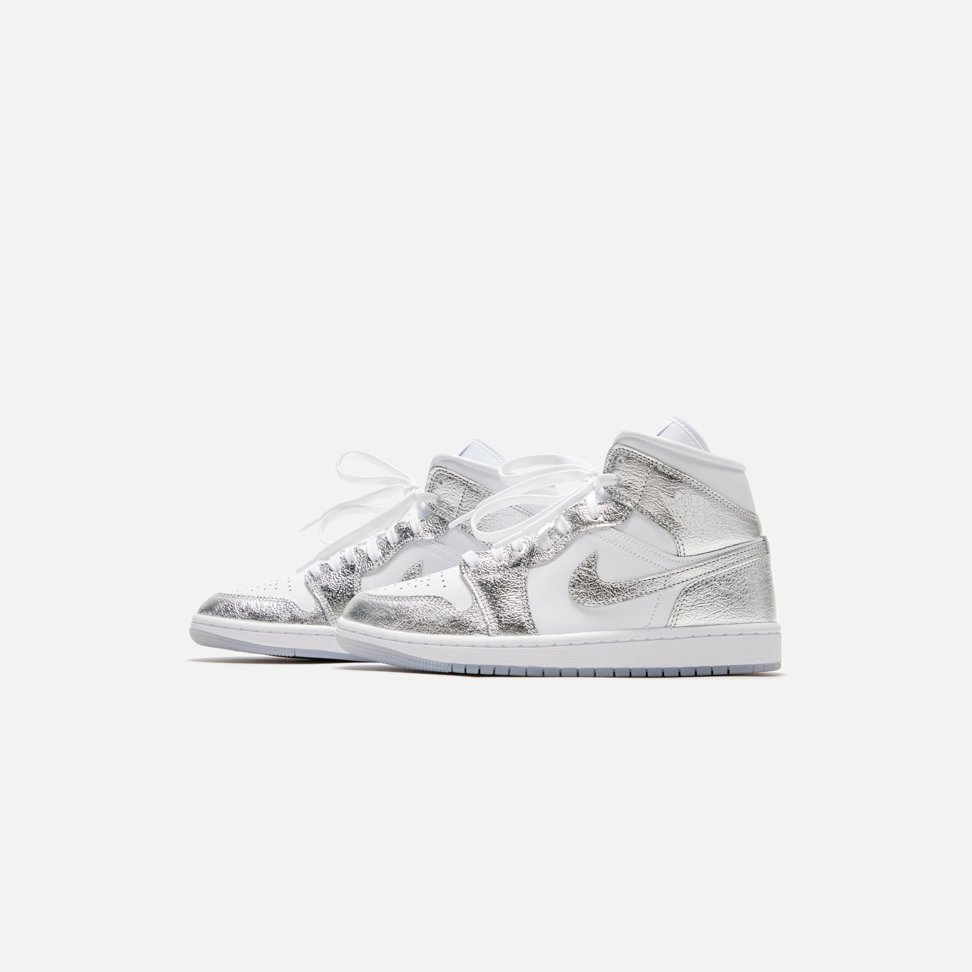 Jordan WMNS Air Jordan 1 Mid SE - White / Metallic Silver