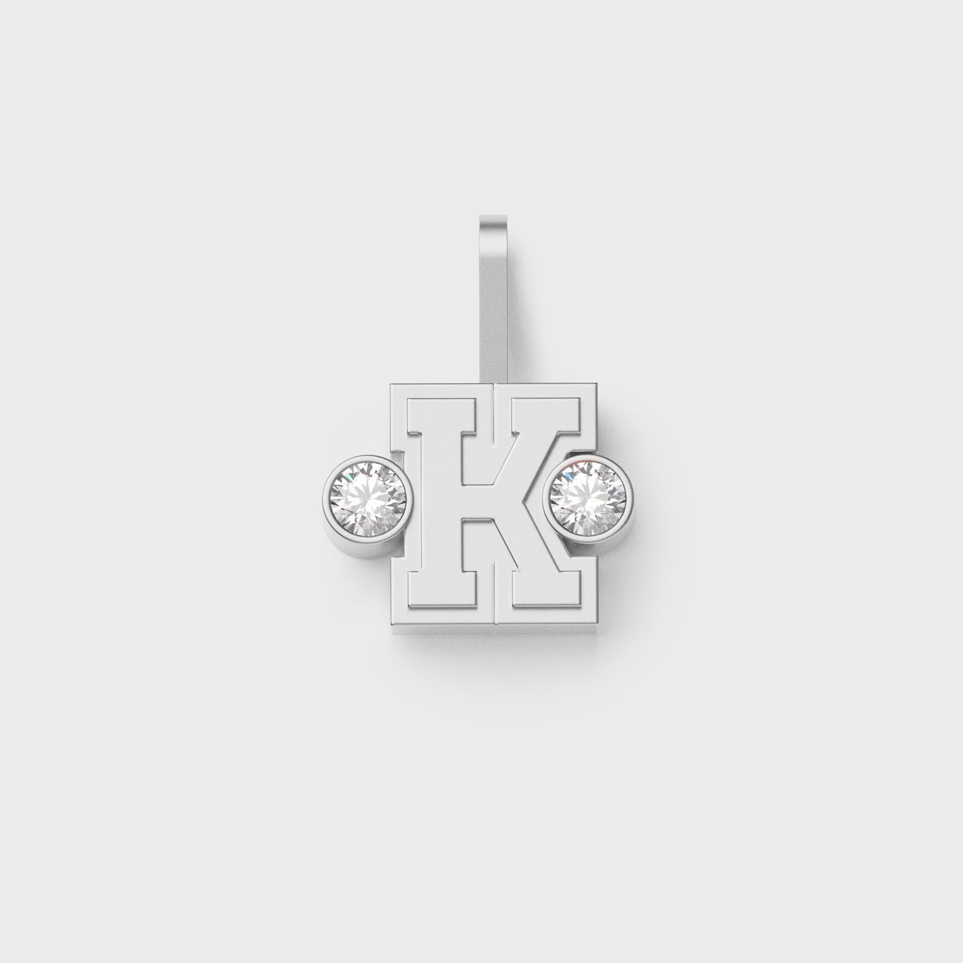 Greg Yuna Sylver Baby sterling silver letter K pendant flanked by two round bezel-set diamonds