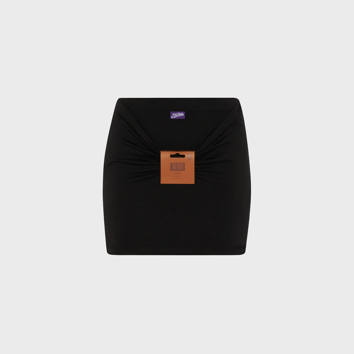 Jean Paul Gaultier The Label black mini skirt with logo waistband label and hang tag, flat lay