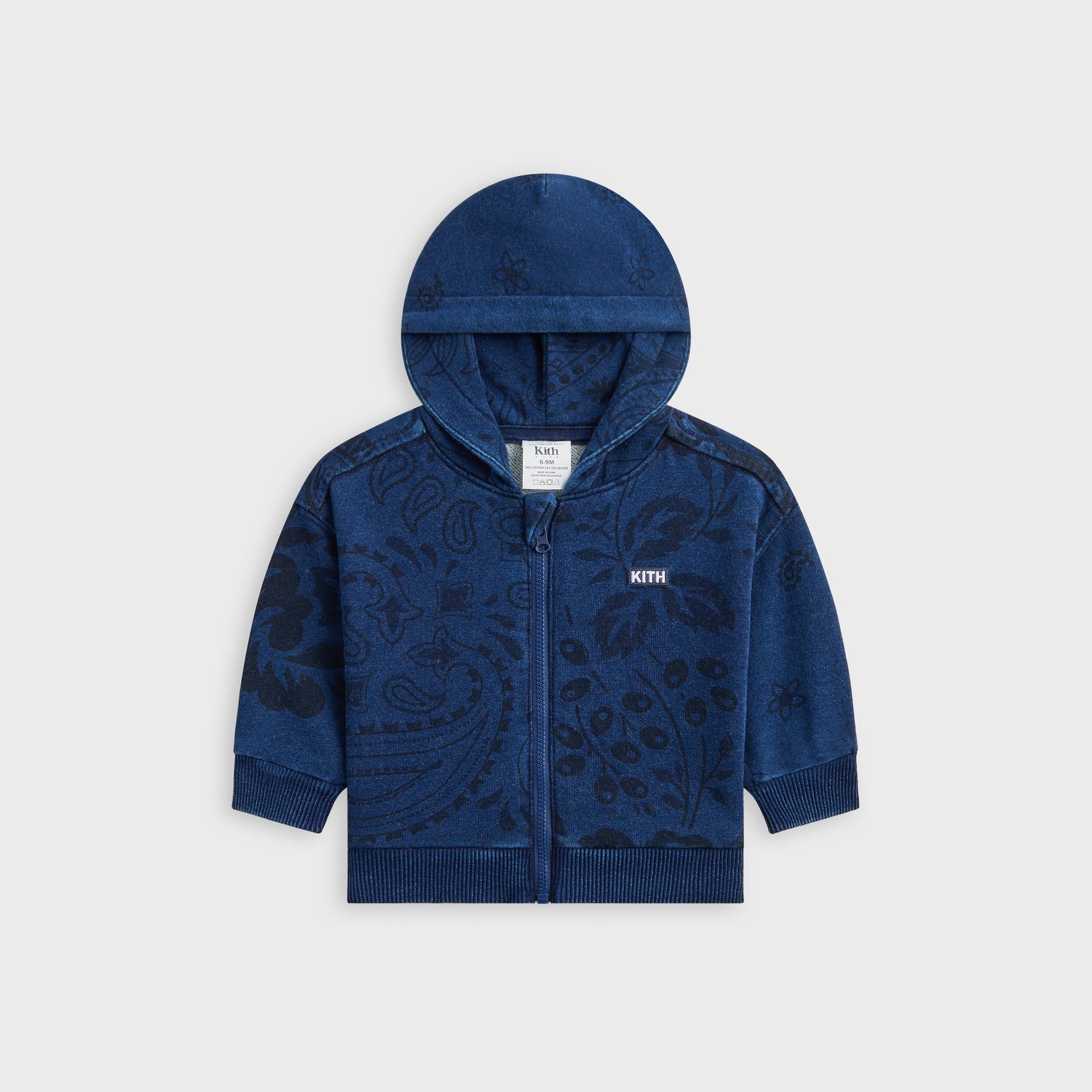 Kith Baby Full Zip Hoodie in Dark Indigo with tonal paisley floral print, flat lay front view with KITH label