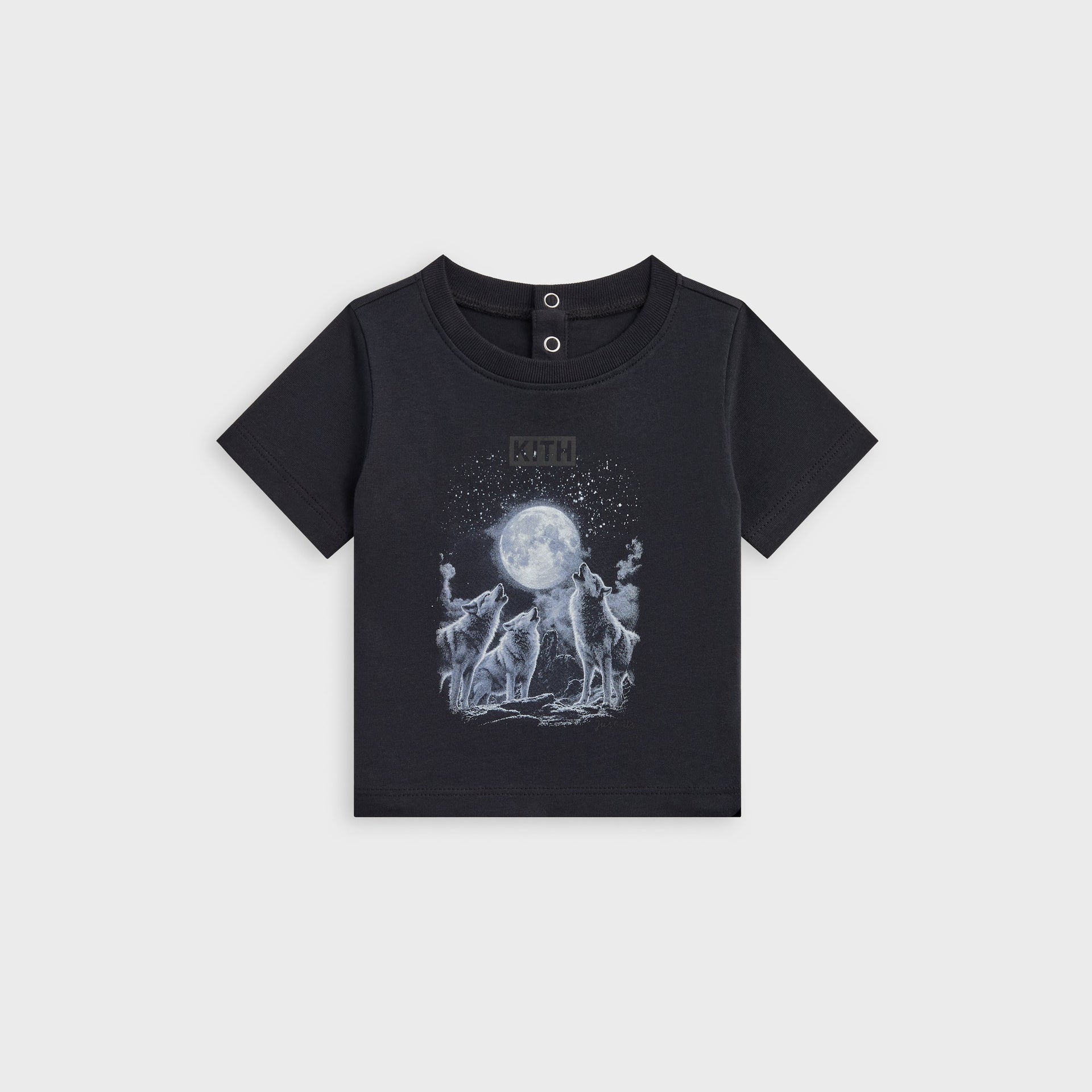 Kith Baby Coyote Short Sleeve Tee in black, flat lay front with howling wolves moon graphic and KITH logo