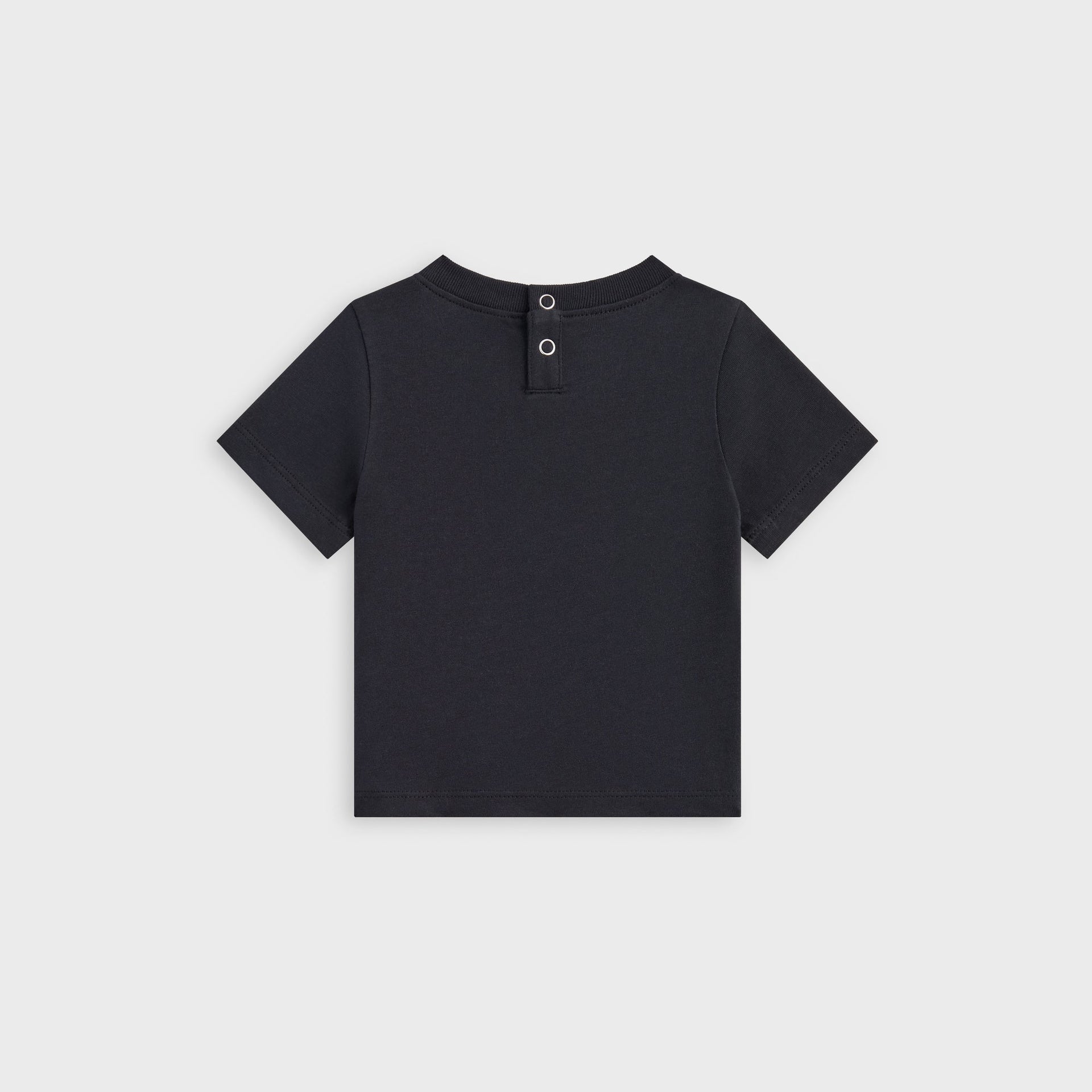 Kith Baby Coyote Short Sleeve Tee in black, flat lay back view with neck snap closure