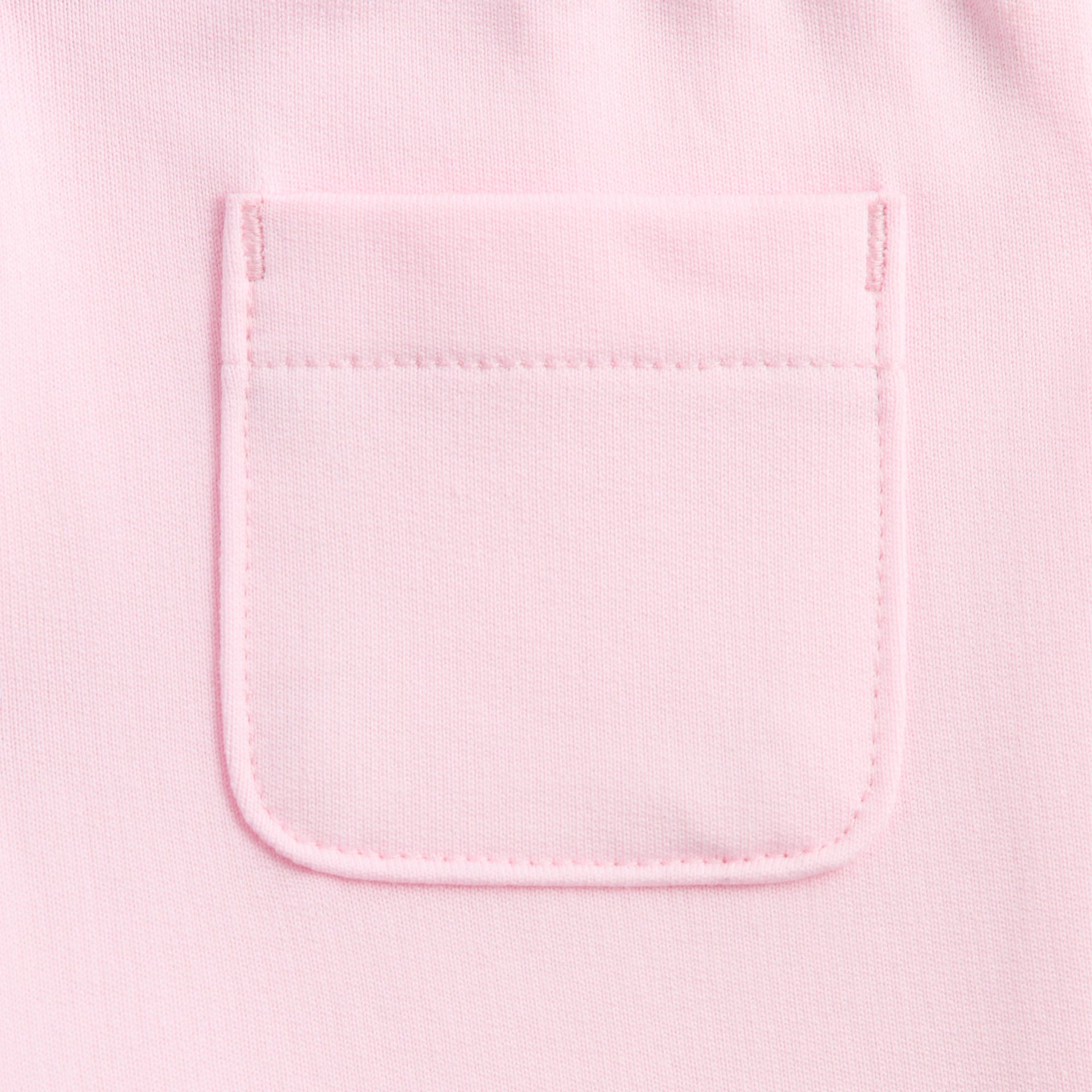 Kith Baby Alani Sweatpant close-up of pink back patch pocket and topstitching