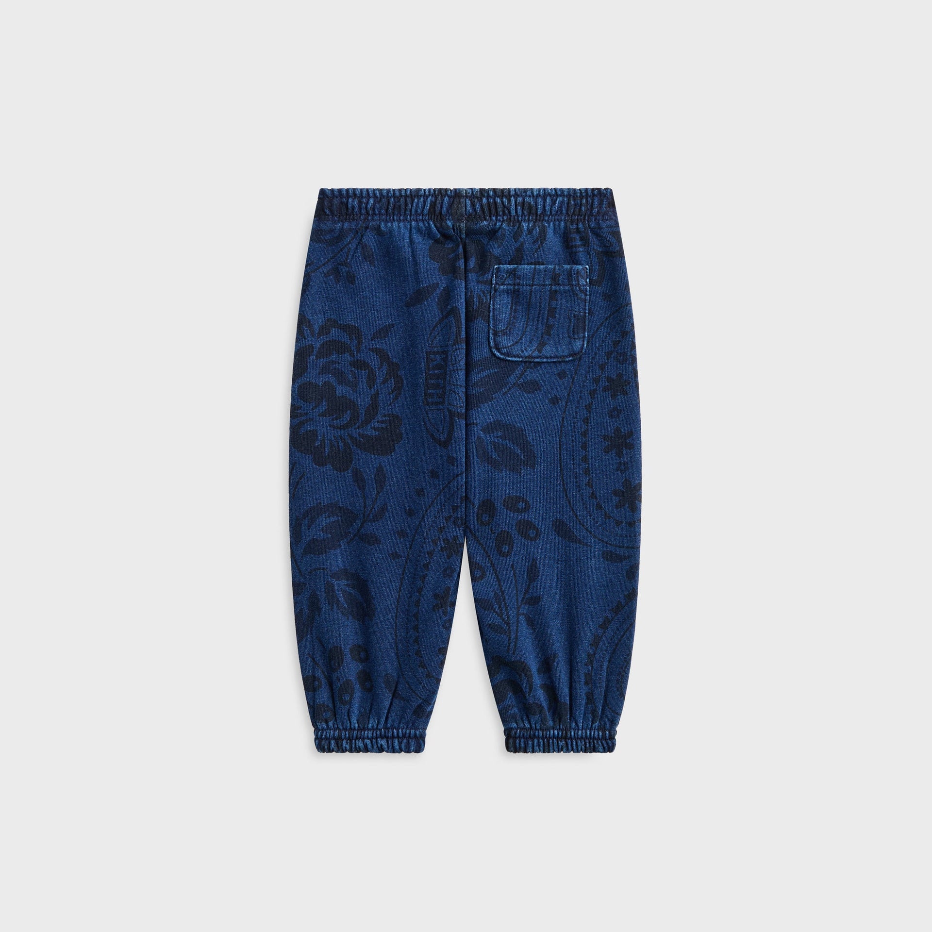 Kith Baby Paisley Nelson Sweatpant in Dark Indigo, back flat lay showing patch pocket and floral paisley print