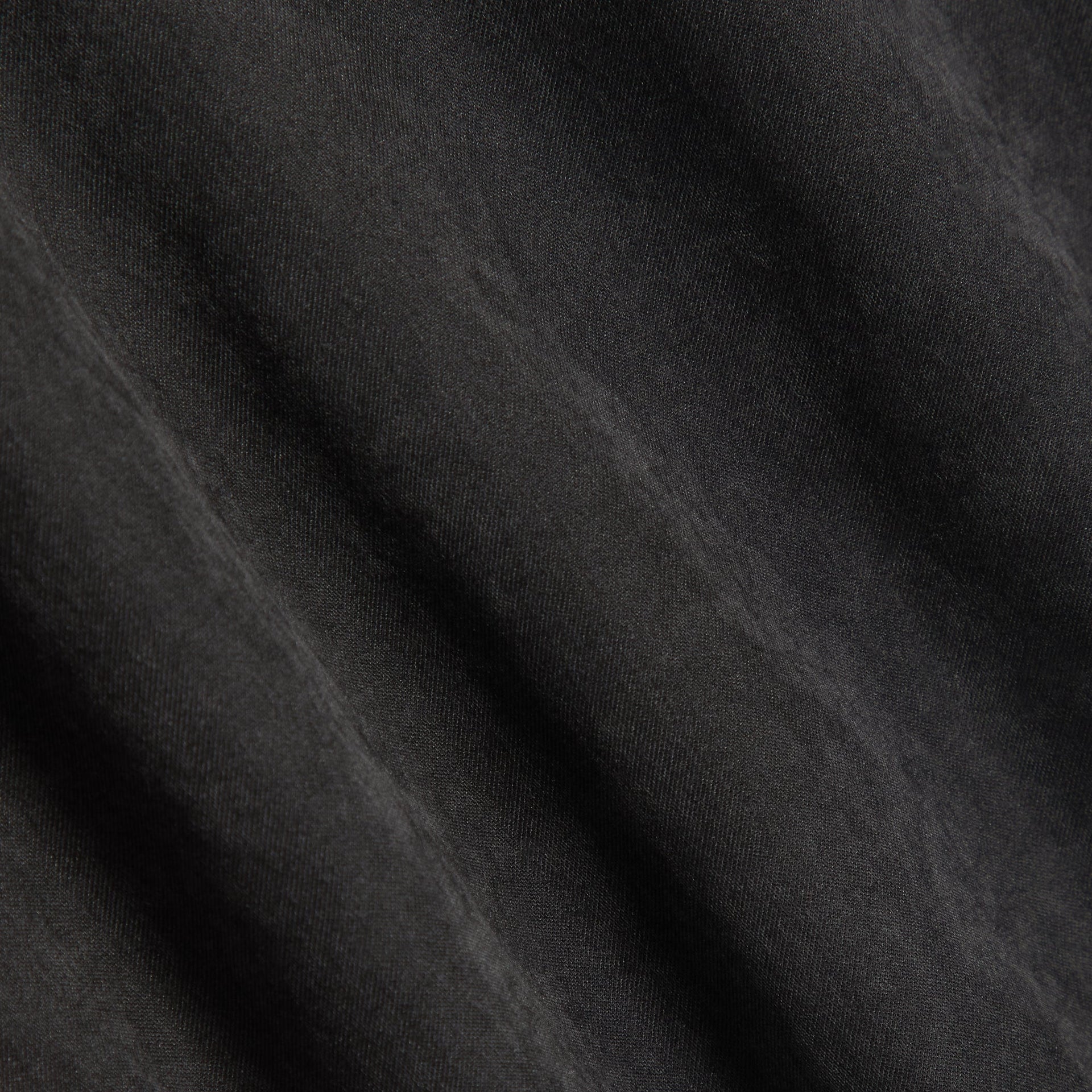 Kith Kids Linden Track Jacket, close-up of black woven nylon fabric texture