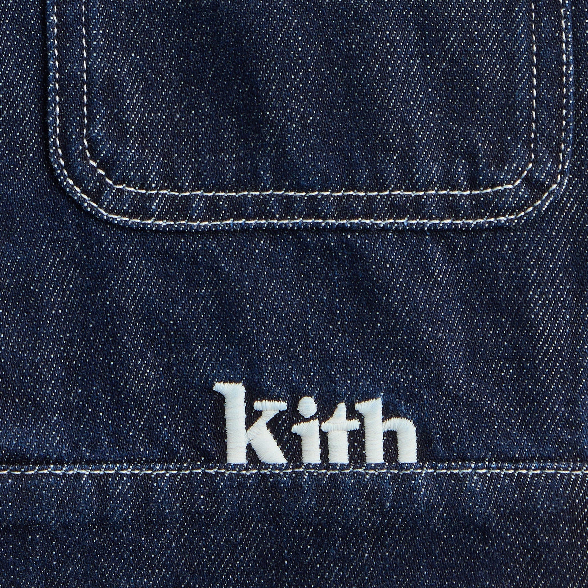 Kith Kids Alonzo II Denim Jacket, close-up of chest flap pocket and white kith script embroidery