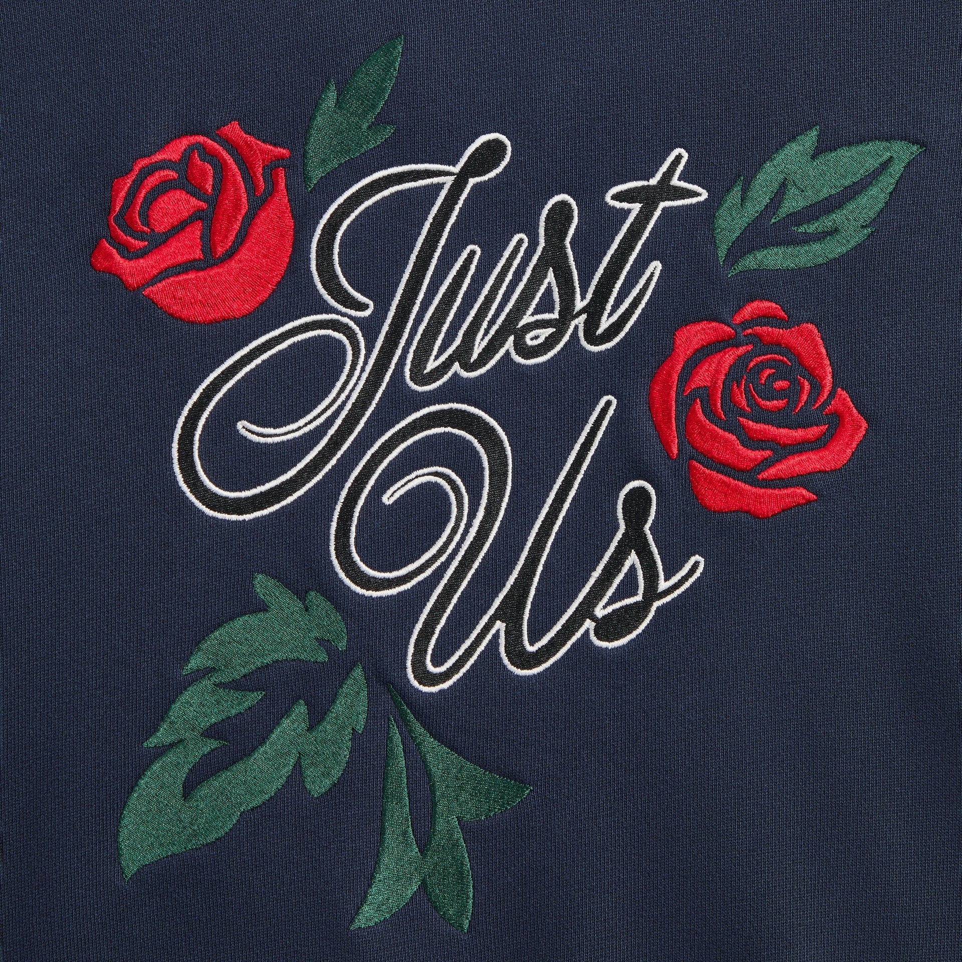 Kith Kids Wyona Bomber Jacket in Nocturnal navy, close-up of Just Us script back embroidery with red roses