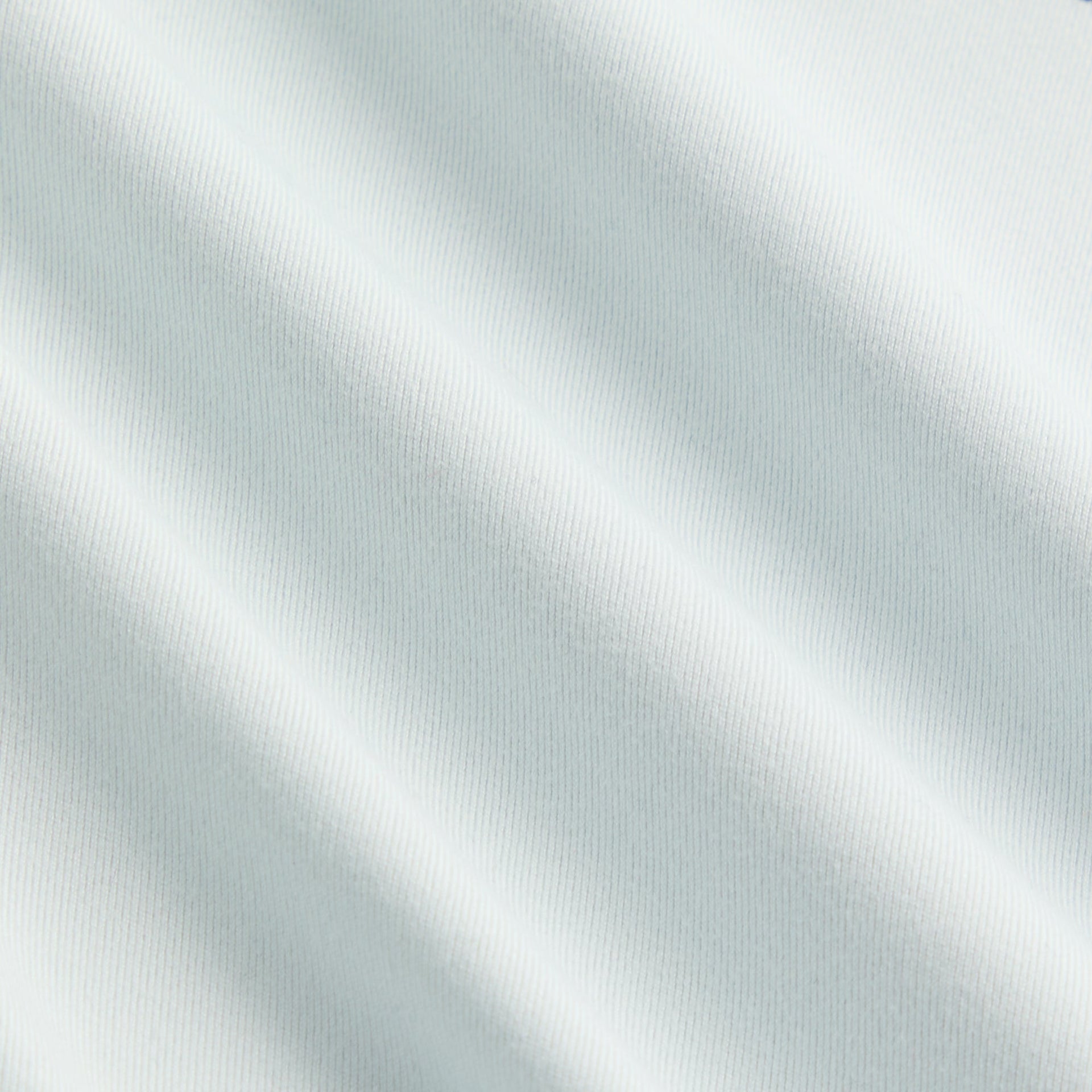 Close-up of soft stretch fabric texture on Kith Kids Active Tiana III Tank in Surry pale blue