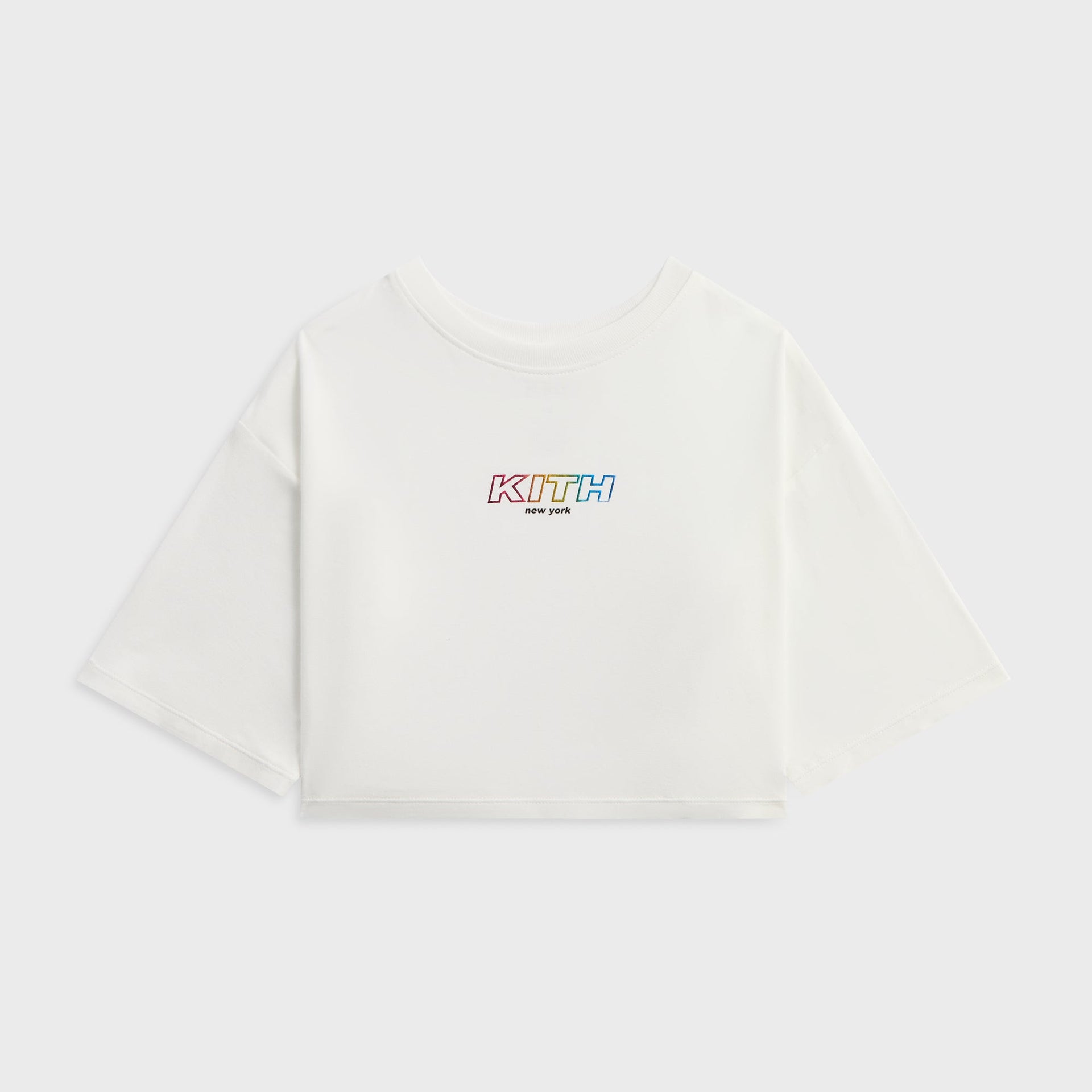 Kith Kids Fei Cropped Tee in white, front flat lay with rainbow KITH New York logo at center chest