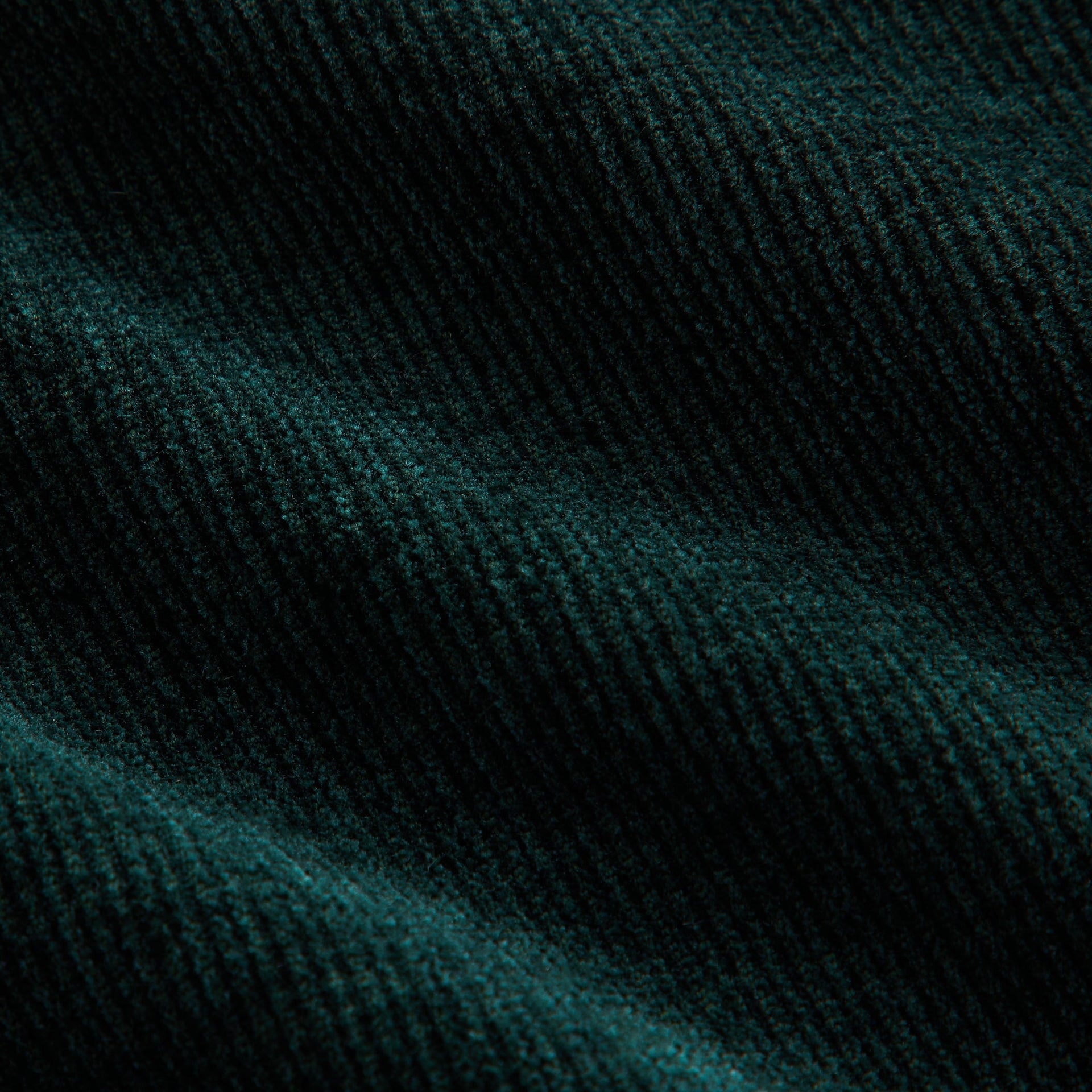 Kith Kids Reversible Ora Shacket, close-up of ribbed dark green corduroy fabric texture