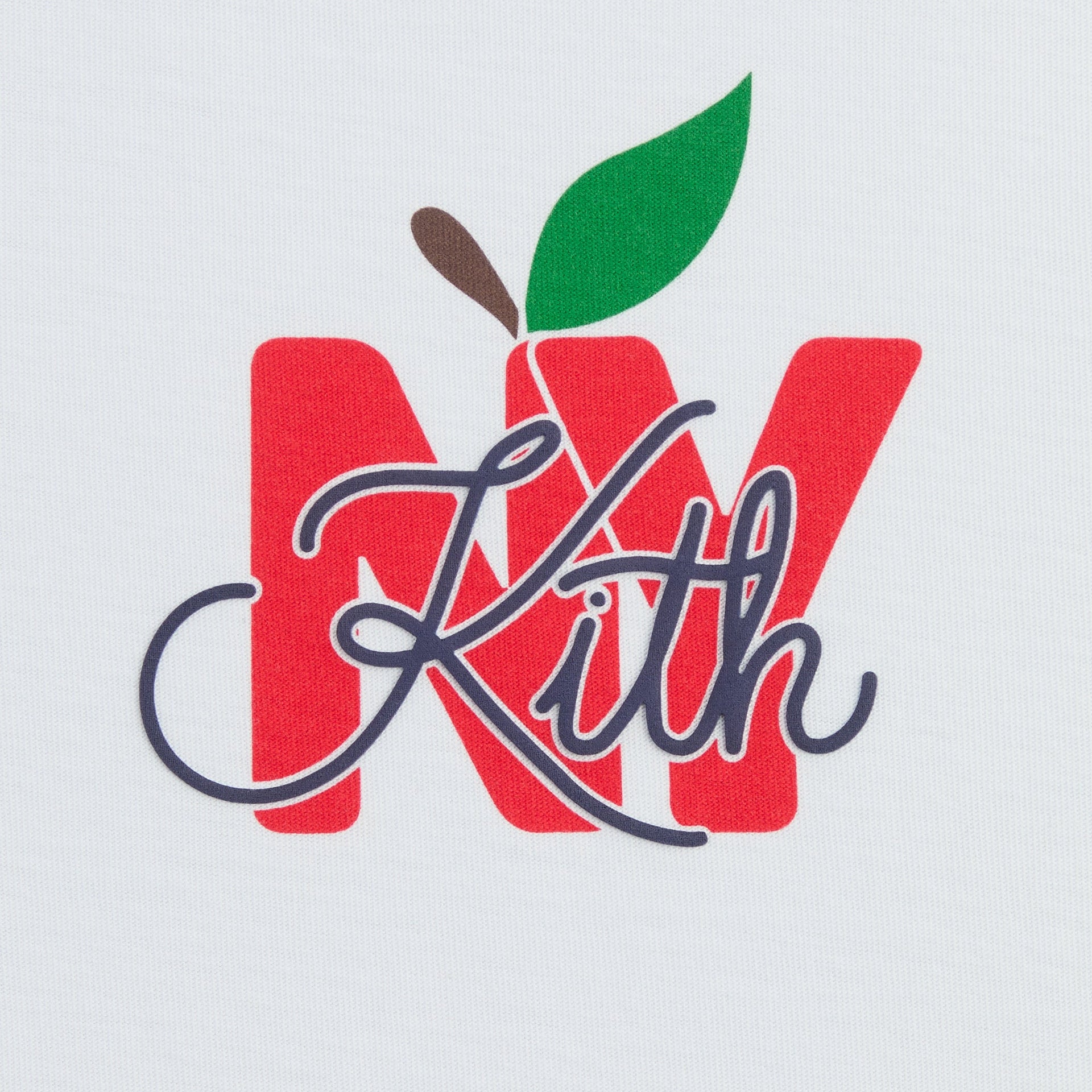 Kith Kids Apple Mulberry II Tee, close-up of red NY apple chest graphic with navy Kith script
