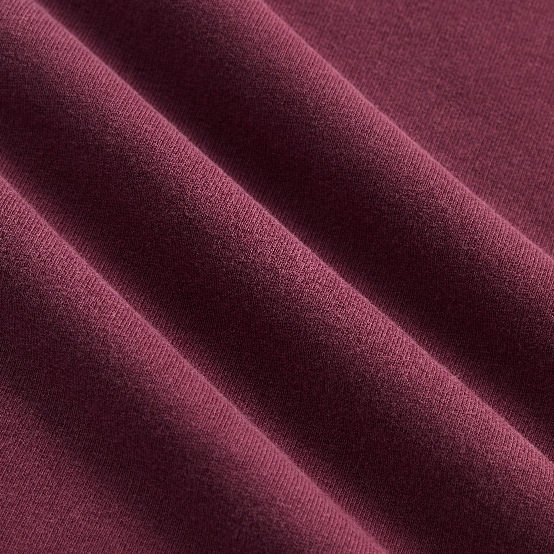 Kith Kids Classic Mott Tee close-up of burgundy cotton jersey fabric texture