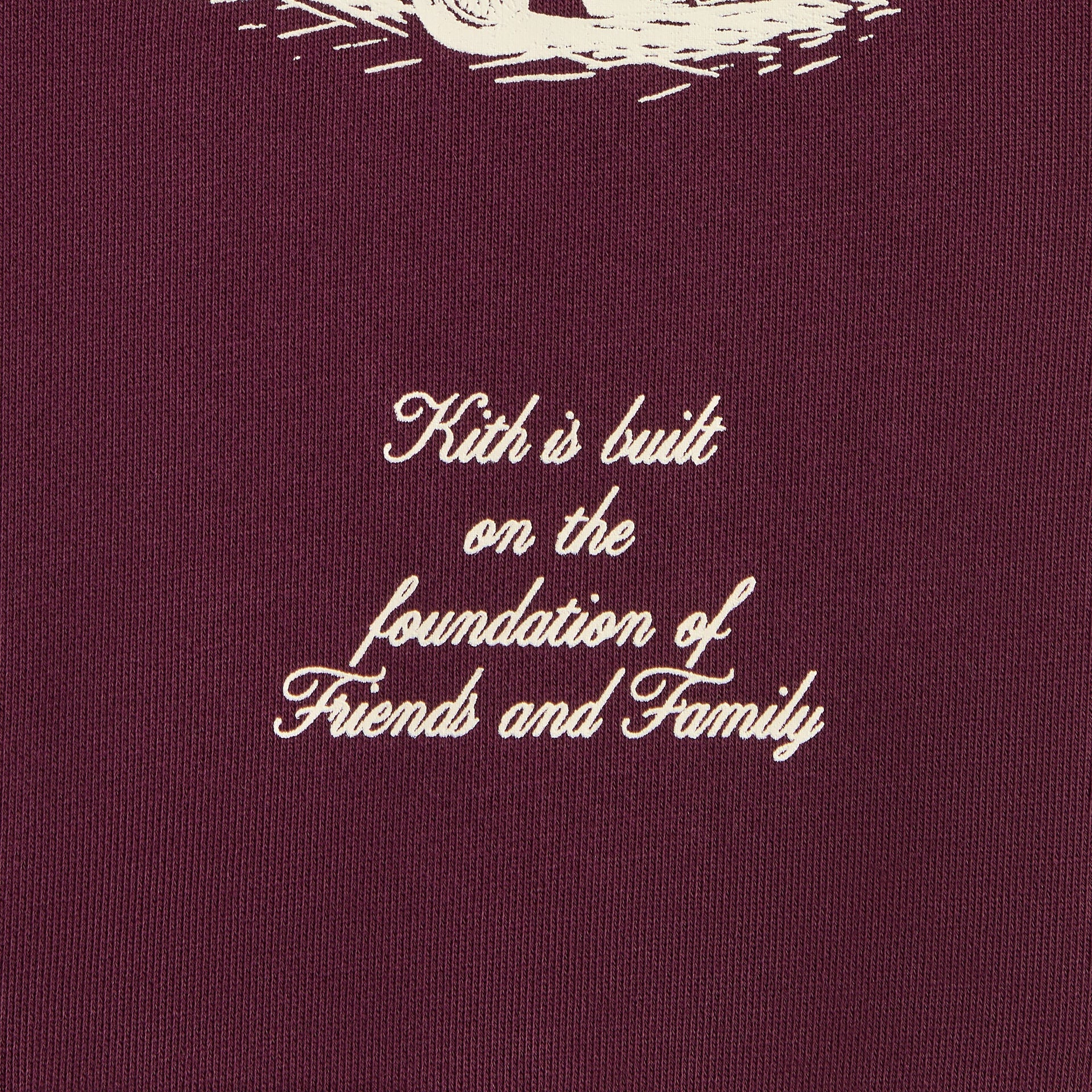 Kith Kids Hunter Pullover close-up of cream Kith is built on Friends and Family script print