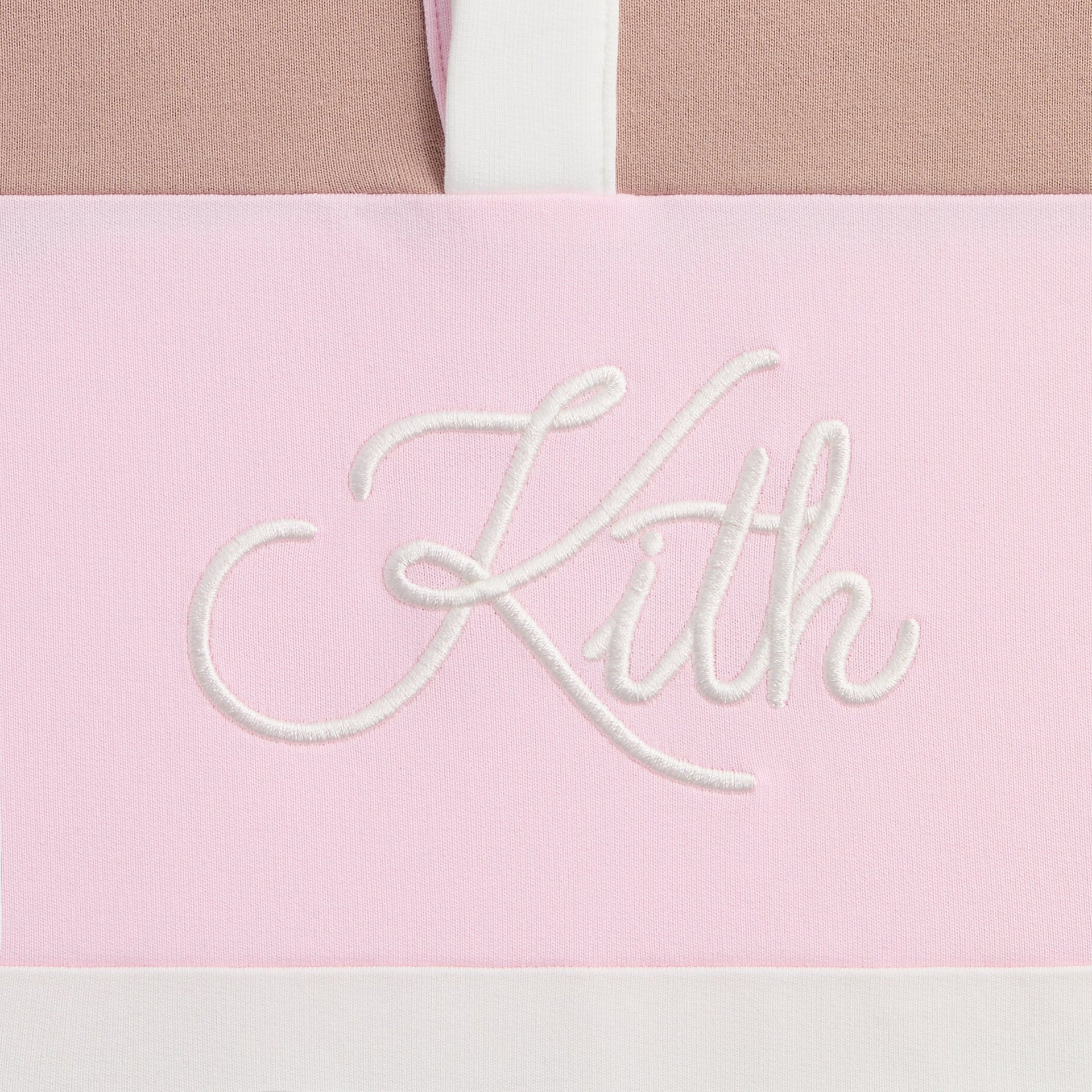 Kith Kids Blocked Cropped Rugby in pink Bloom, close-up of white Kith script embroidery