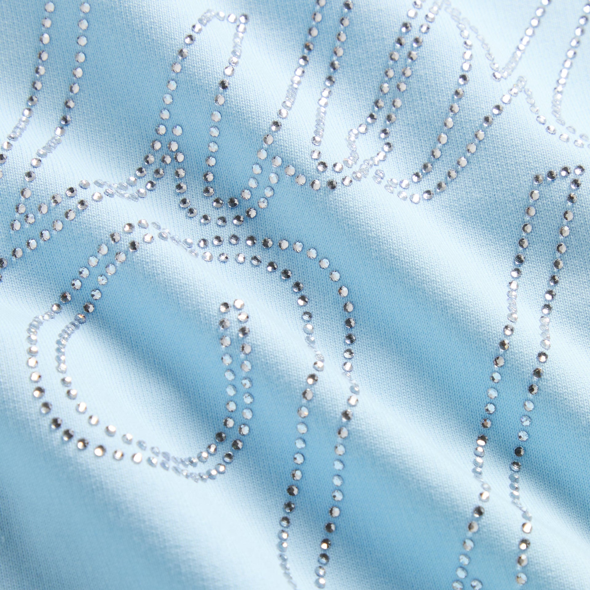 Kith Kids Cropped Nelson Hoodie macro of silver rhinestone script detail on light blue fabric