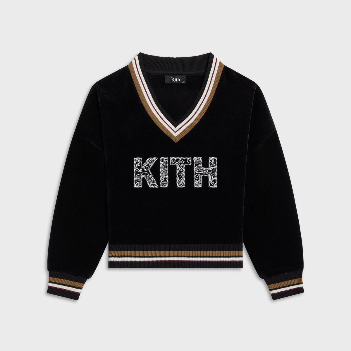 Kith Kids Textured V-Neck Nelson sweatshirt in black, front flat lay with tan and burgundy cricket-stripe trim and a paisley KITH chest logo