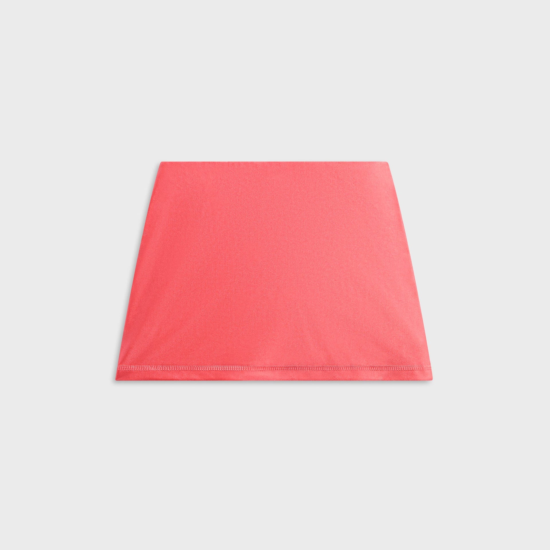 Kith Kids Active Ari Skort in carnation coral, back flat lay view showing plain paneled hem