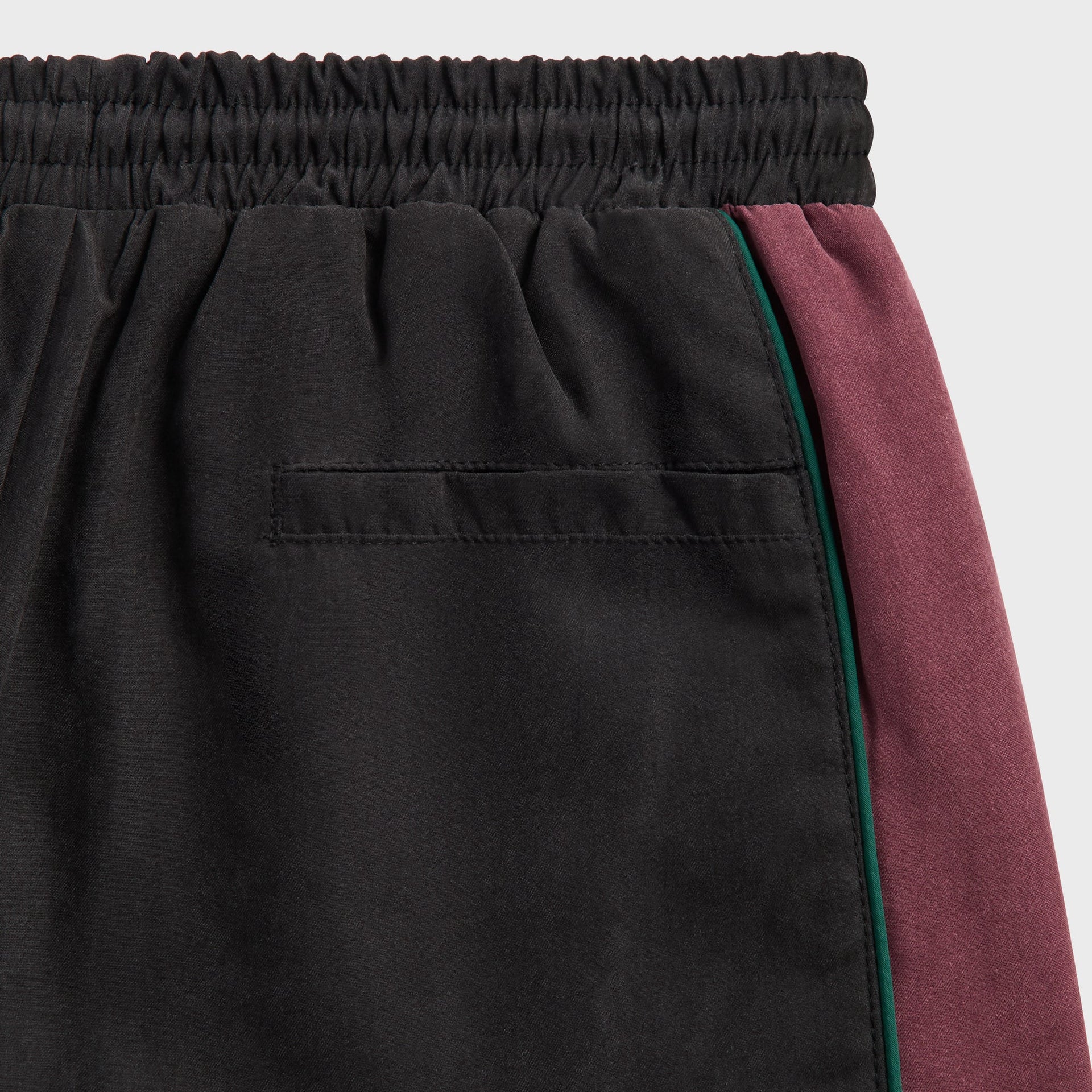 Kith Kids Milo II Track Pant in black, close-up of drawstring elastic waistband and back welt pocket