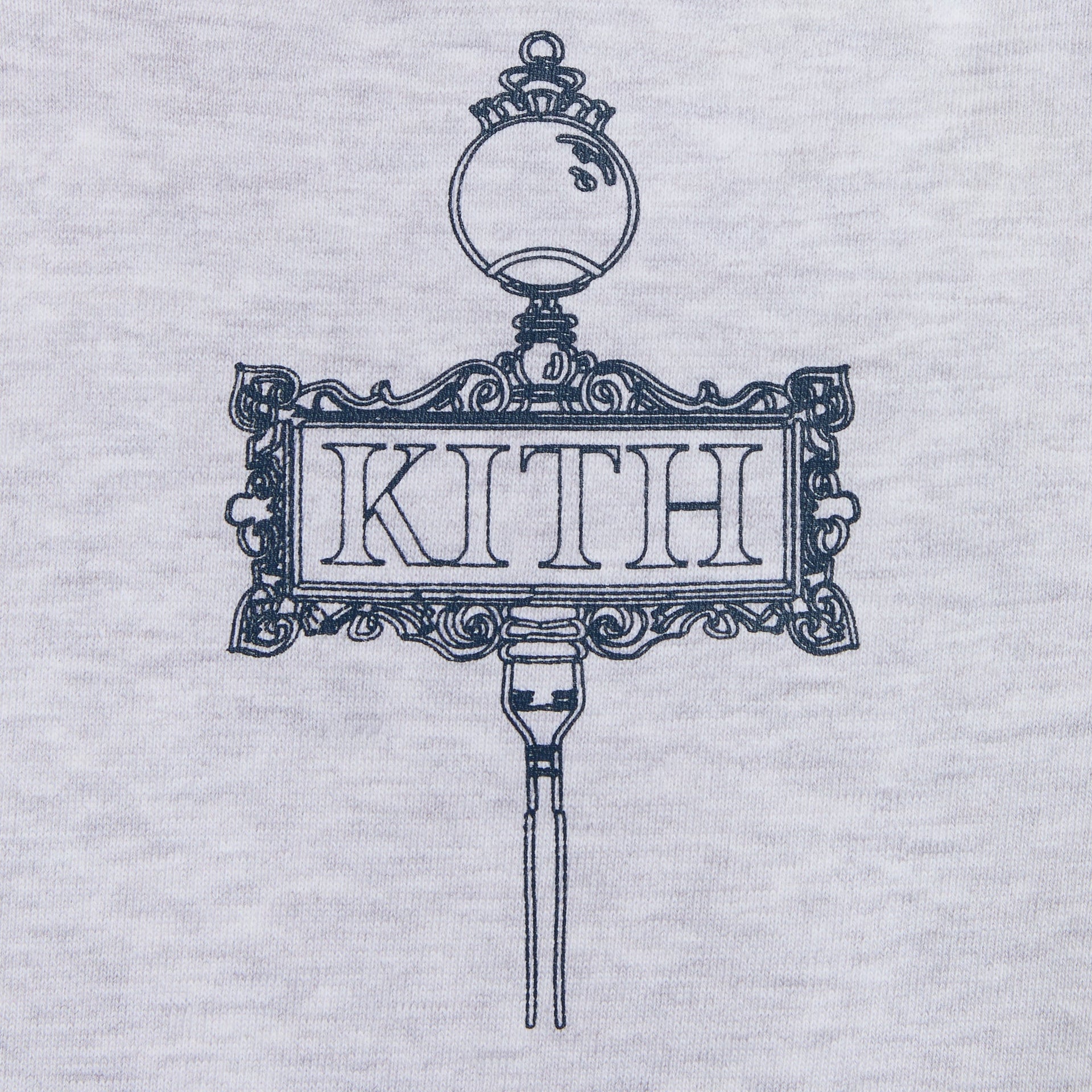Kith Kids Logo Nelson Short in Light Heather Grey, close-up of navy KITH hanging sign graphic print