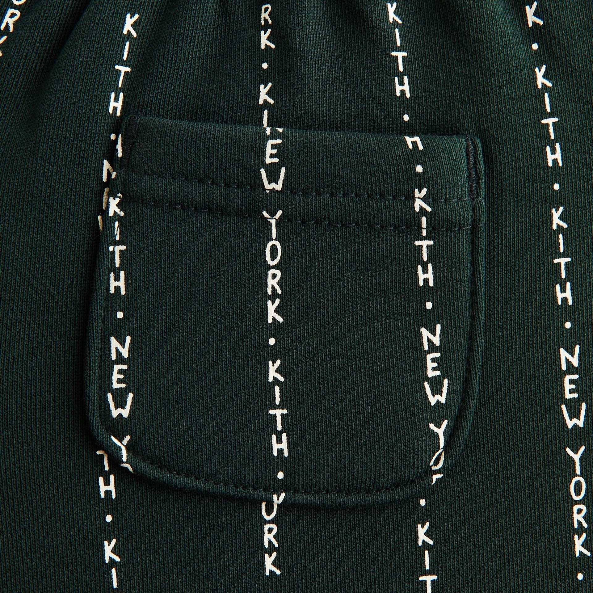 Close-up of back patch pocket on green KITH New York pinstripe Kith Kids Liam Short