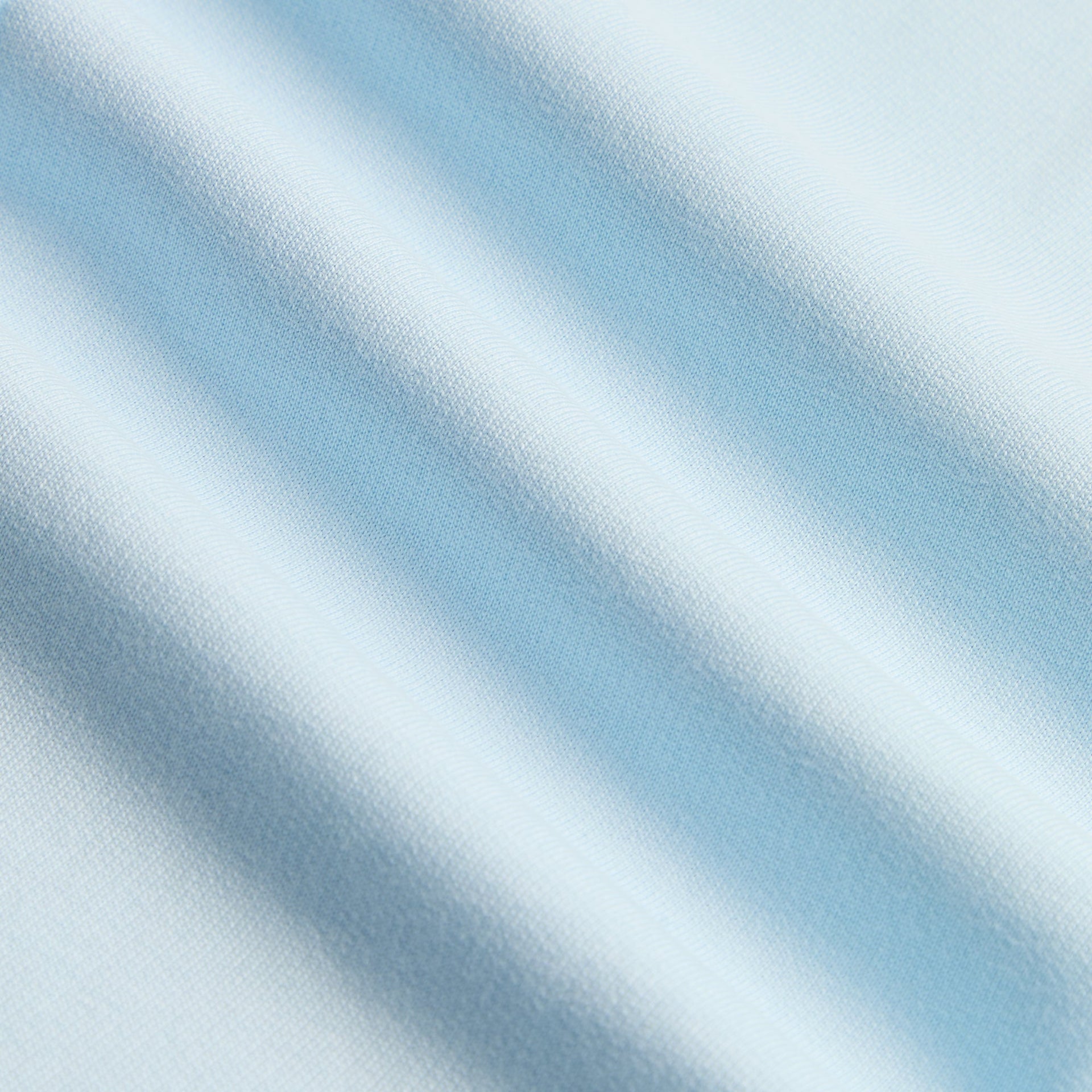 Kith Kids Ava Sweatpant in light blue, macro detail of soft light blue jersey knit fabric