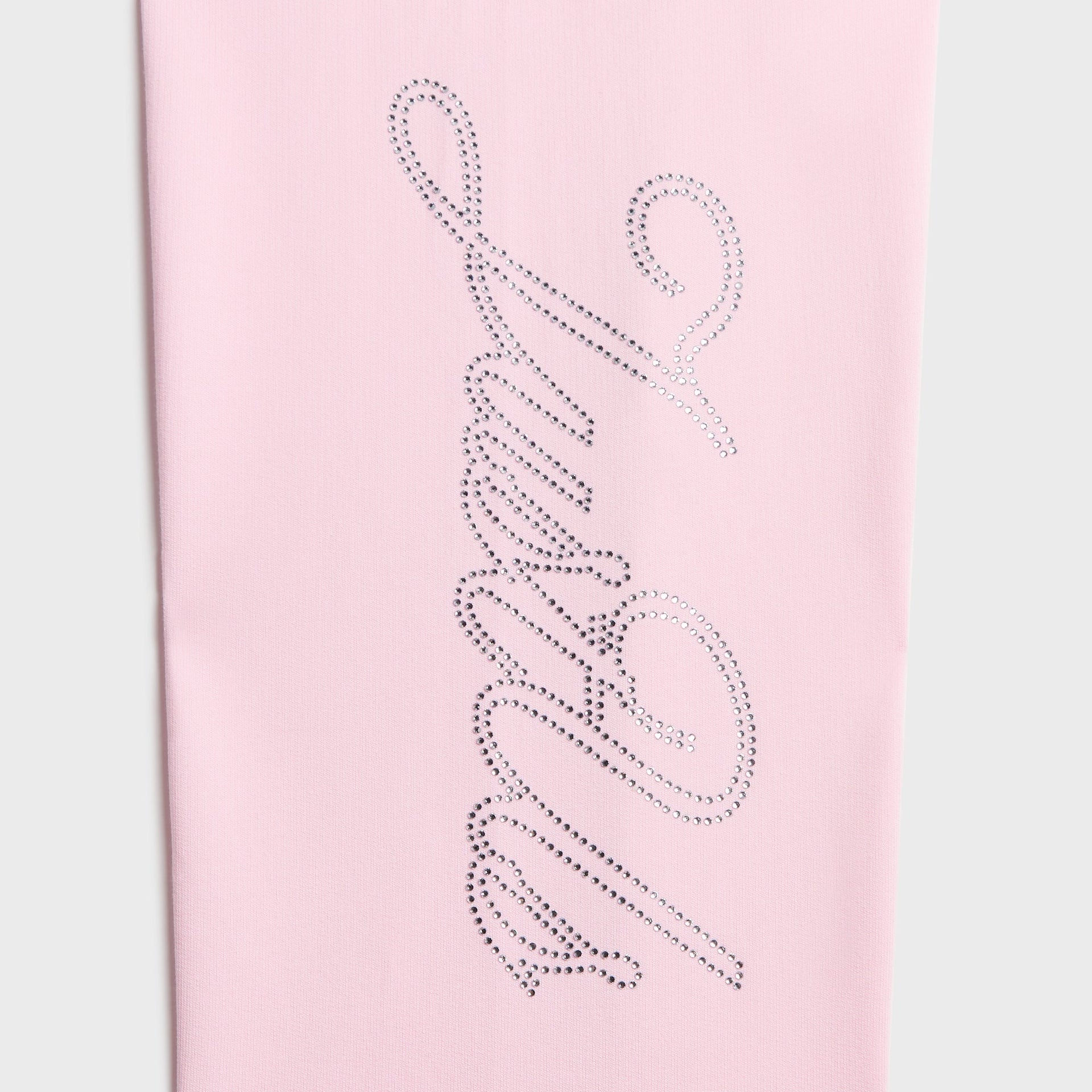Close-up of large rhinestone Kith script logo running down the leg of Bloom pink sweatpants