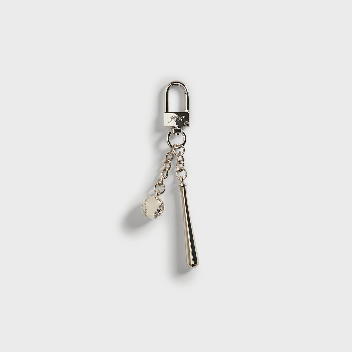 Kith x Yankees Baseball & Bat Keychain - straight-on view of clasp with bat and ball charms