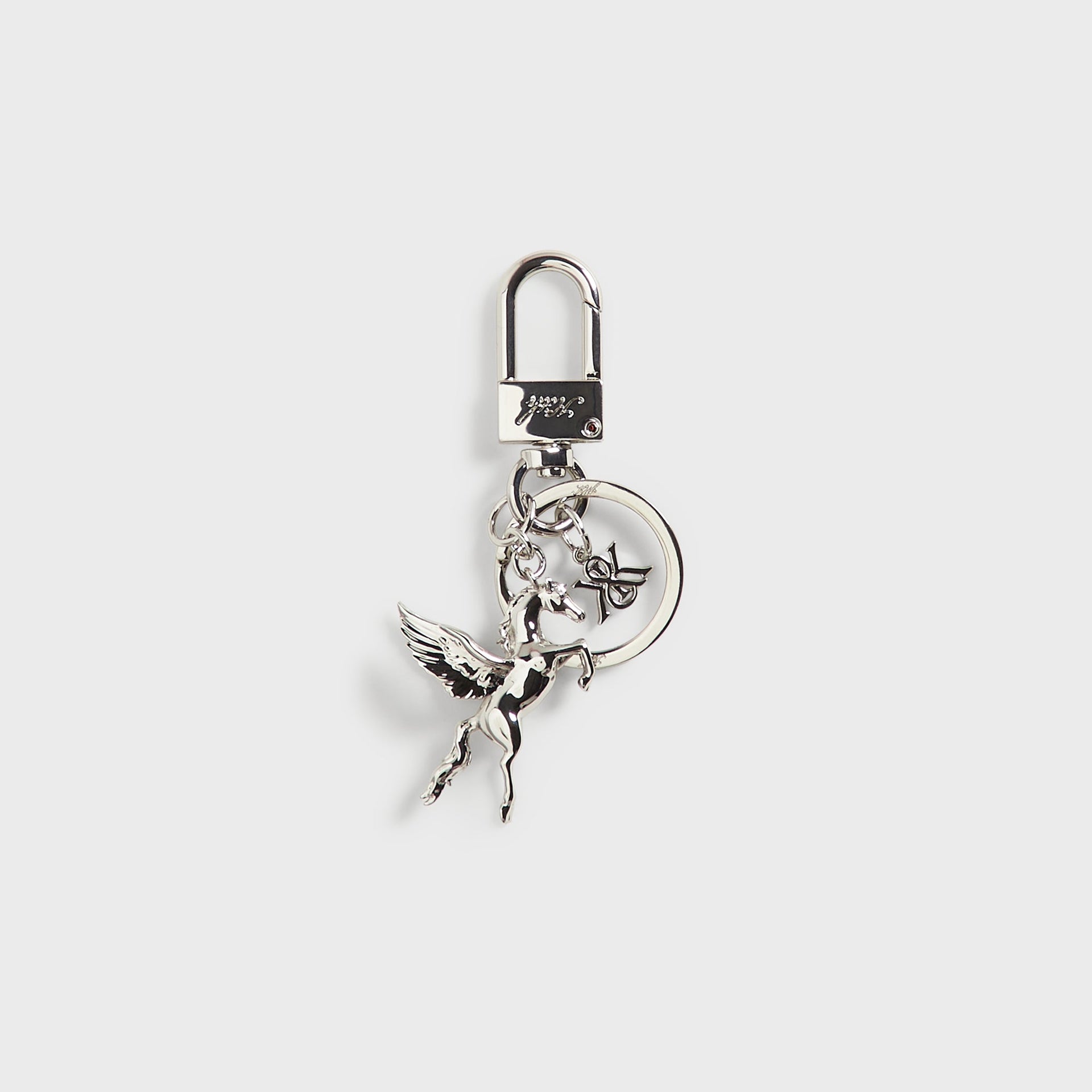 Kith Pegasus Keyring in silver, front view showing the winged horse charm, split ring, and lobster clasp with engraved Kith logo