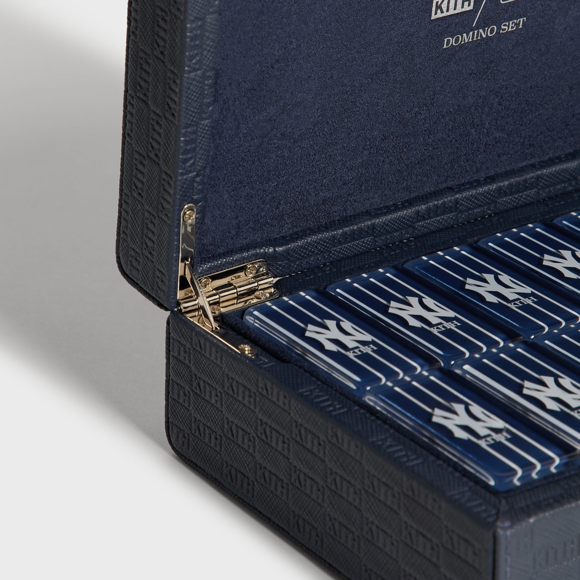 Close-up of the suede lid interior printed with Kith slash MLB Domino Set