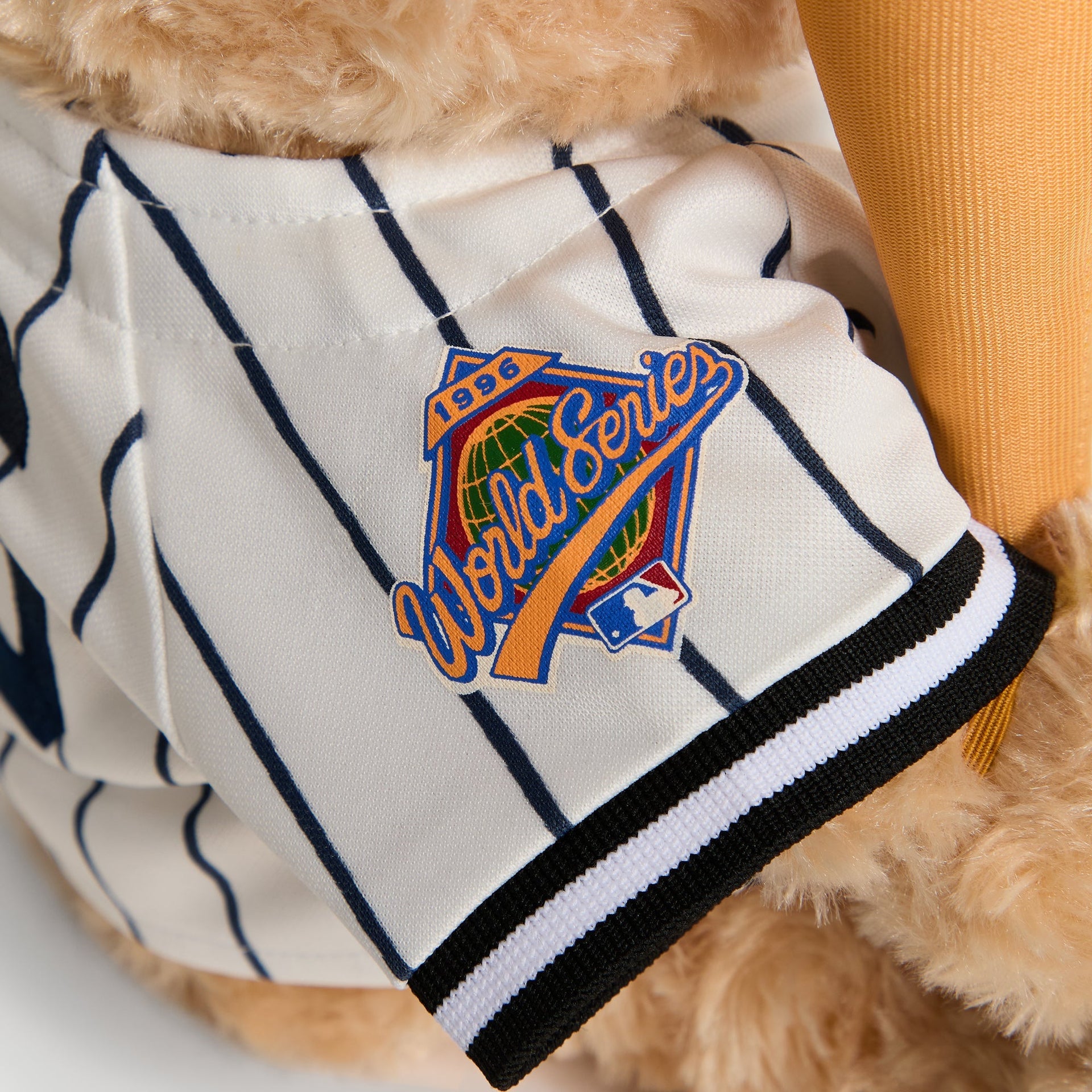 Close-up of 1996 World Series patch on the jersey sleeve of the Sandrift Teddy Bear