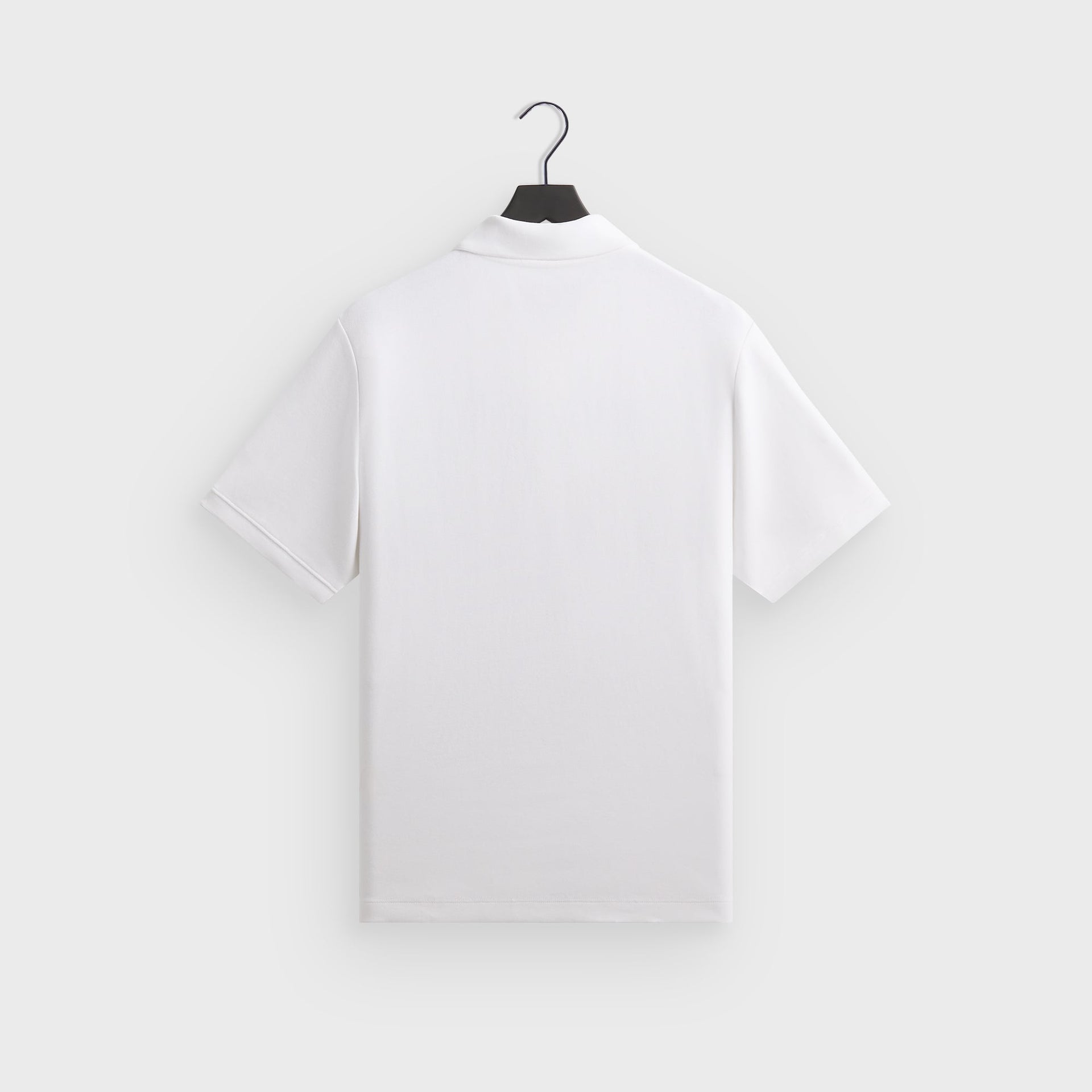 Kith for the New York Knicks Playoffs Ainslie Pique Polo - White