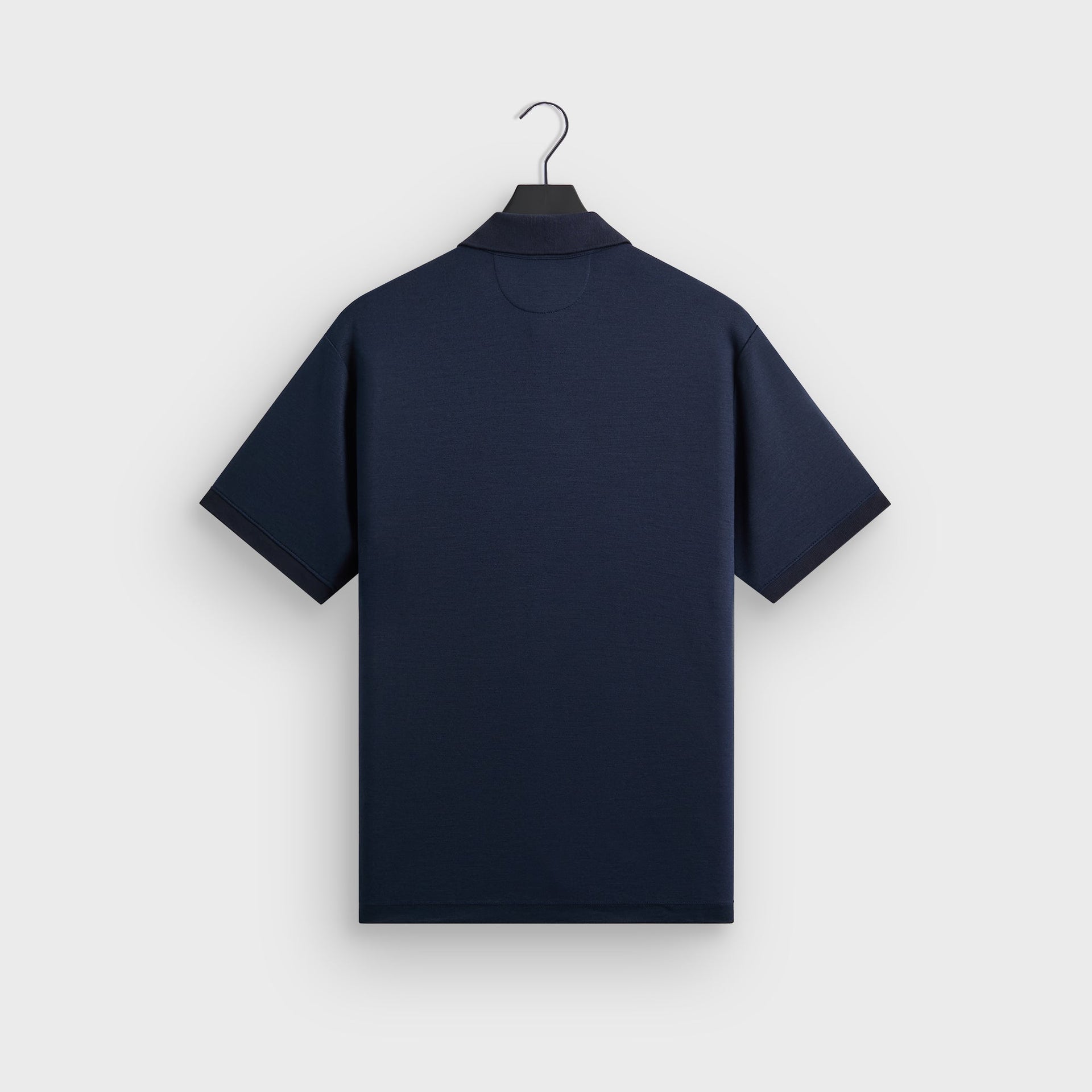 &Kin Melton Polo in Nocturnal navy, back view on hanger showing plain reverse and ribbed collar